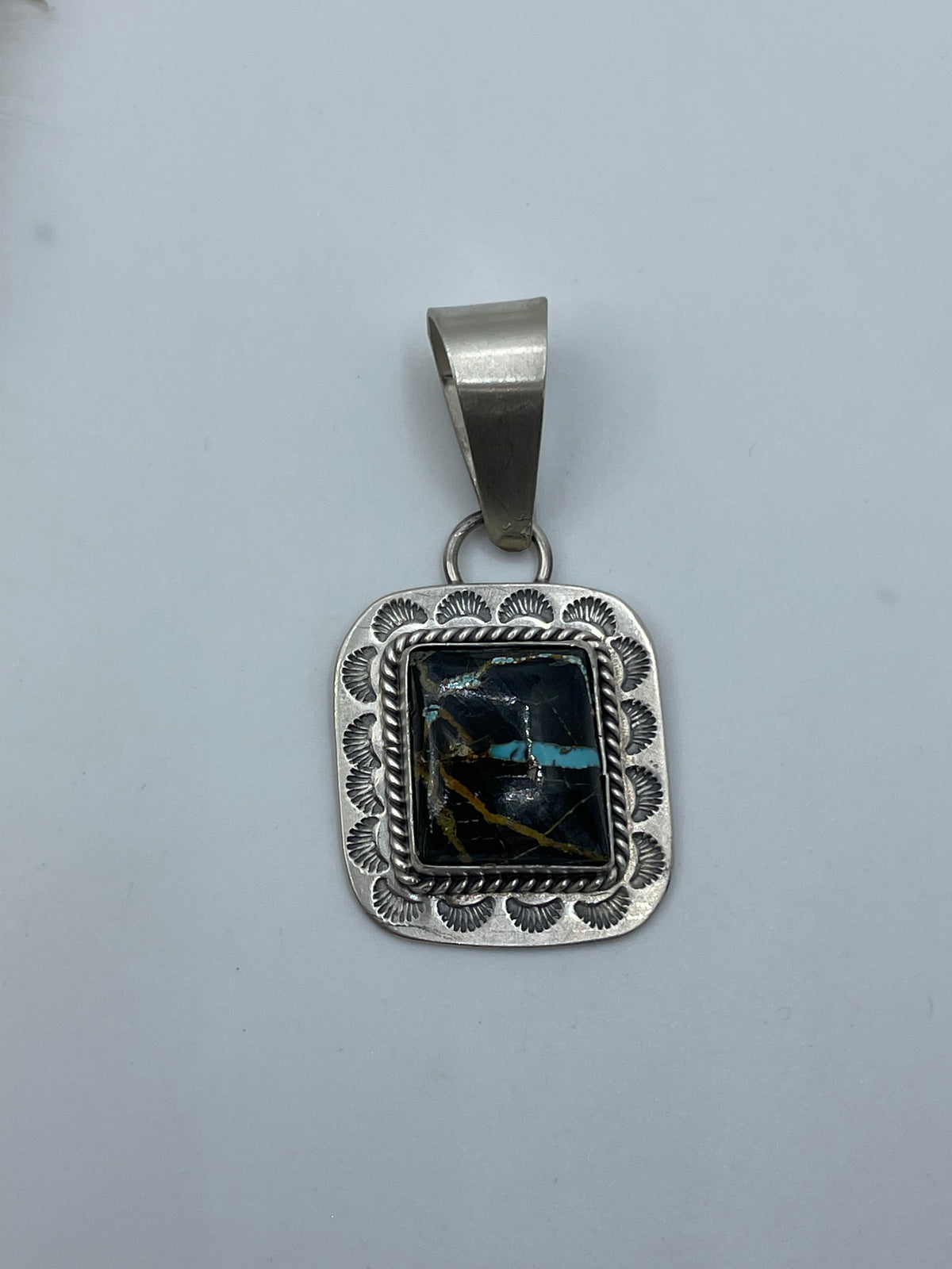 LOT 84 A 9/20 Blackjack Turquoise Pendant by Harold Joe, Navajo