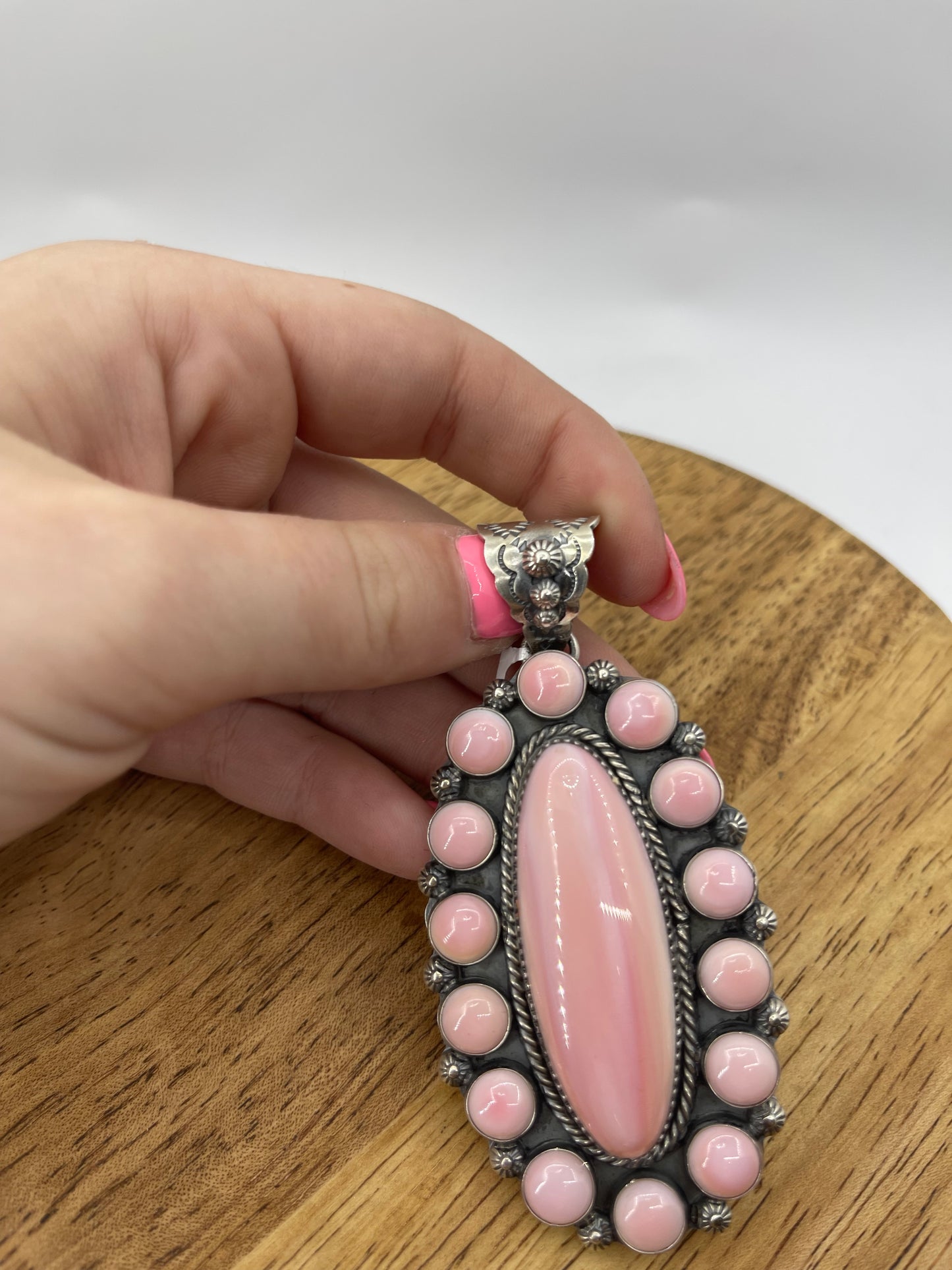 Pink Conch Shell Oval Cluster Pendant by Ned Nez, Navajo