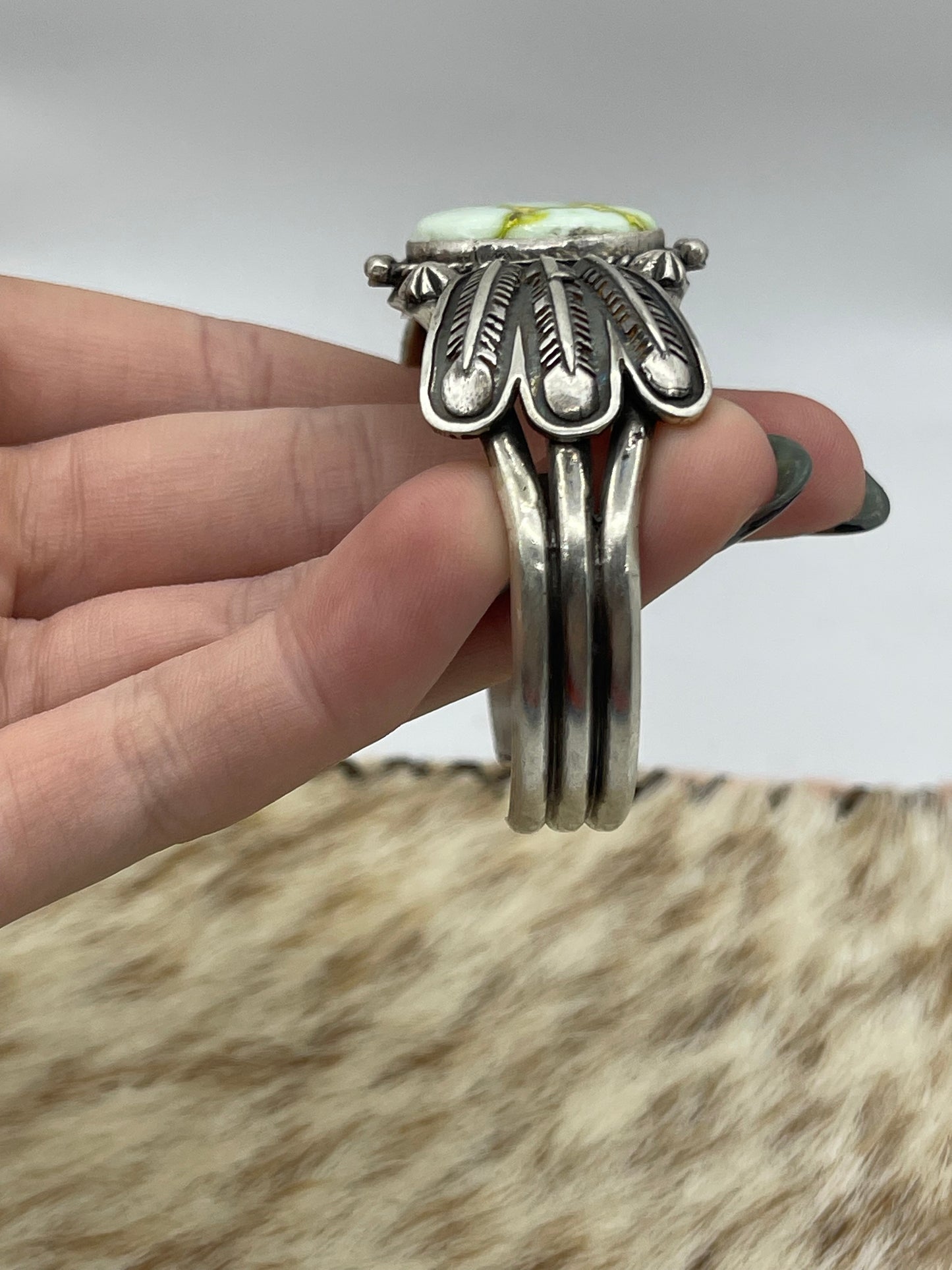 5 3/4"-7 3/4" Palomino Cuff with Feather by Daniel Benally, Navajo (Matrix Varies)