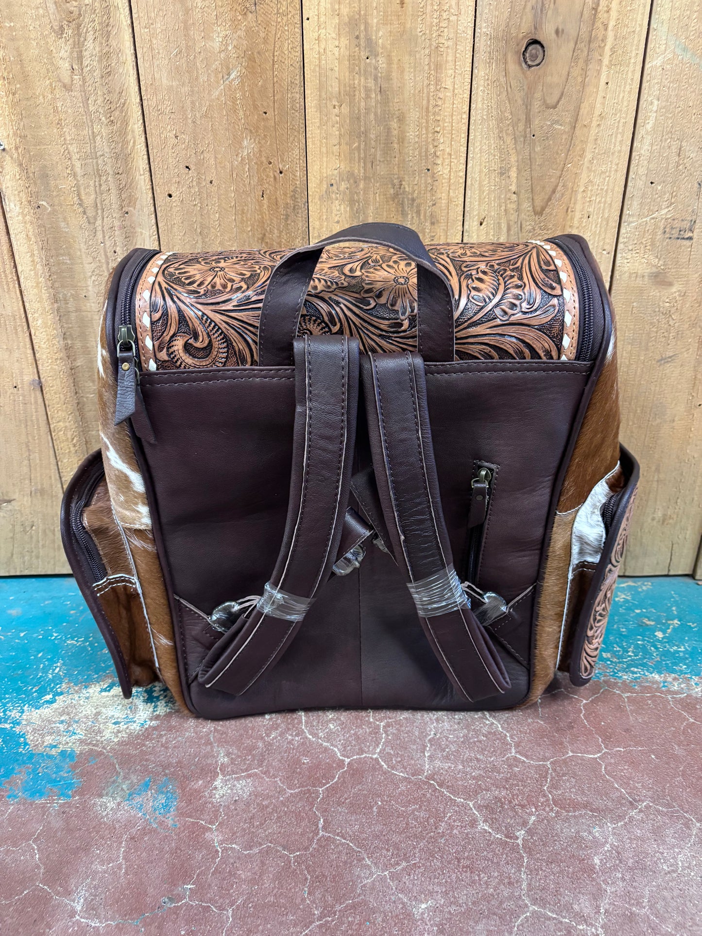 Version 1 Brown and White Cowhide Flower Tooled Leather Backpack