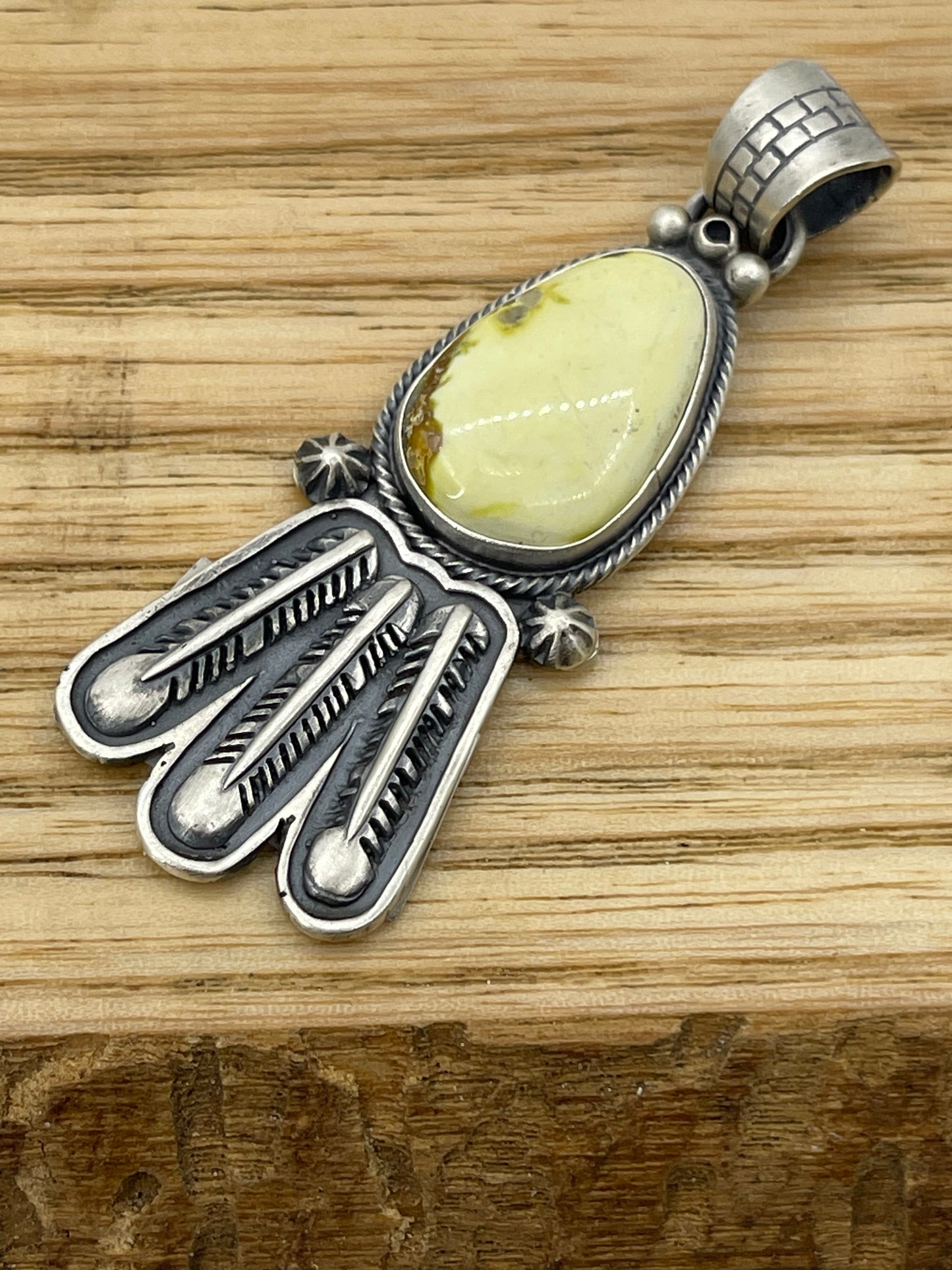 LOT 84 A 11/2 Palomino Turquoise Pendant with Feathers by Marita Benally, Navajo