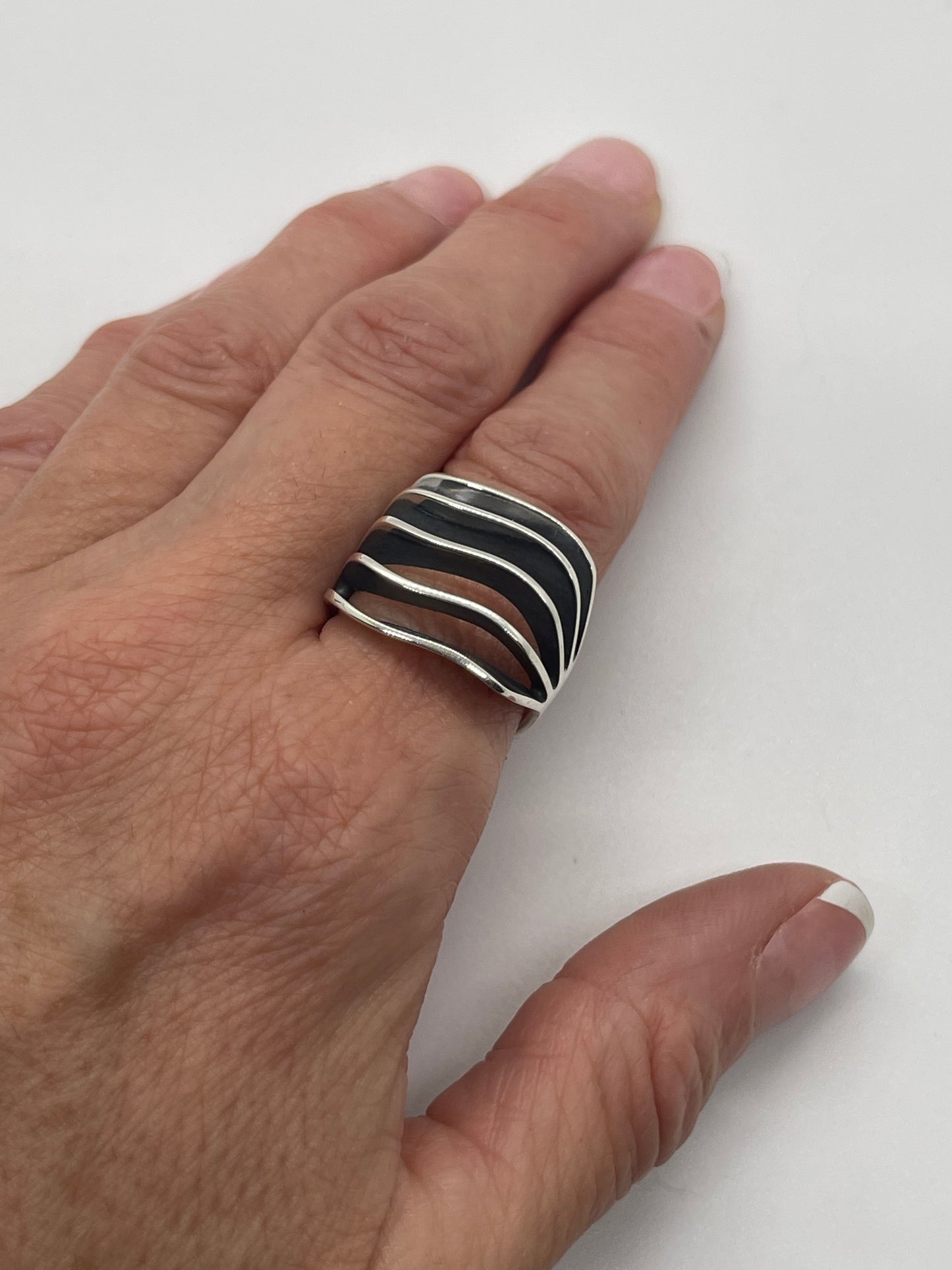 7.0 5 Row Sterling Silver Ring by James Bahe, Navajo