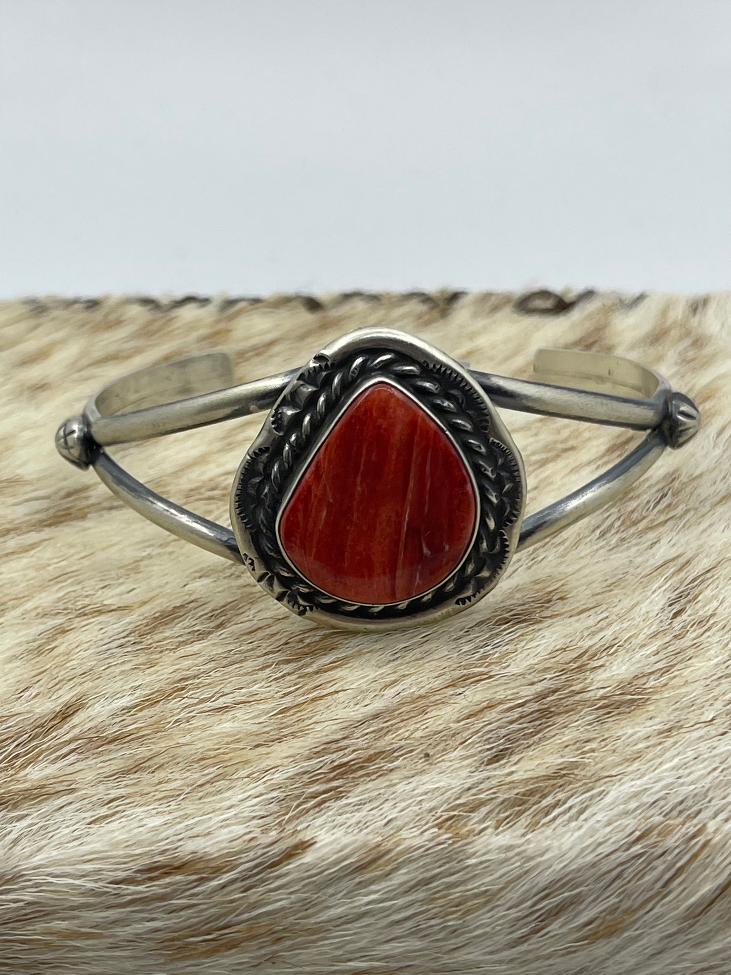 7 3/4"-7 1/4" Teardrop Orange Spiny Oyster Shell Cuff by Augustine Largo, Navajo