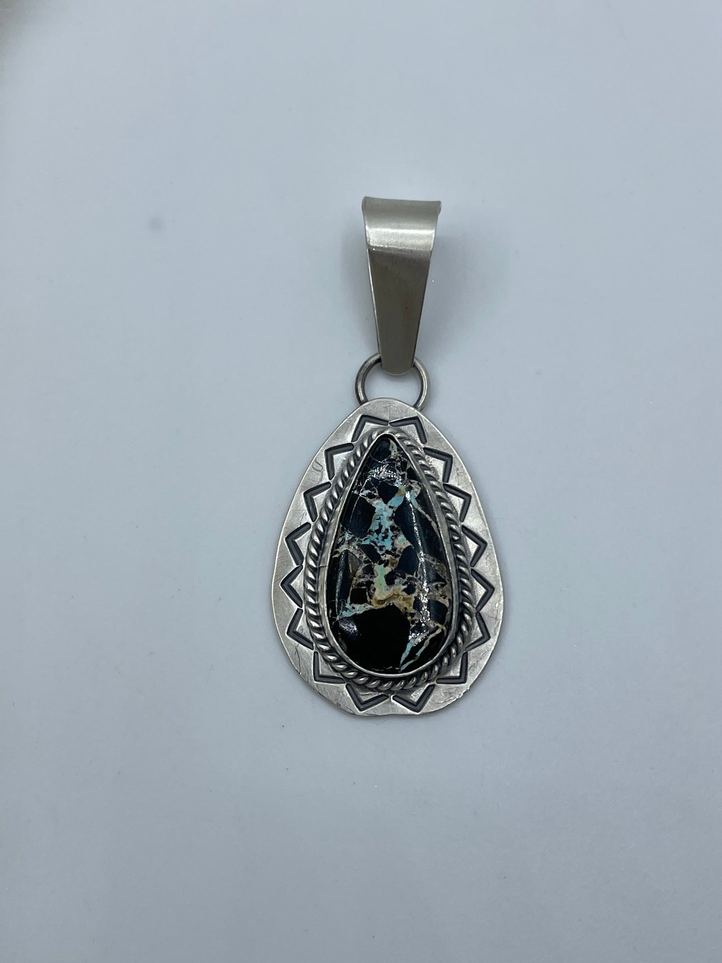 Blackjack Turquoise Pendant by Harold Joe, Navajo