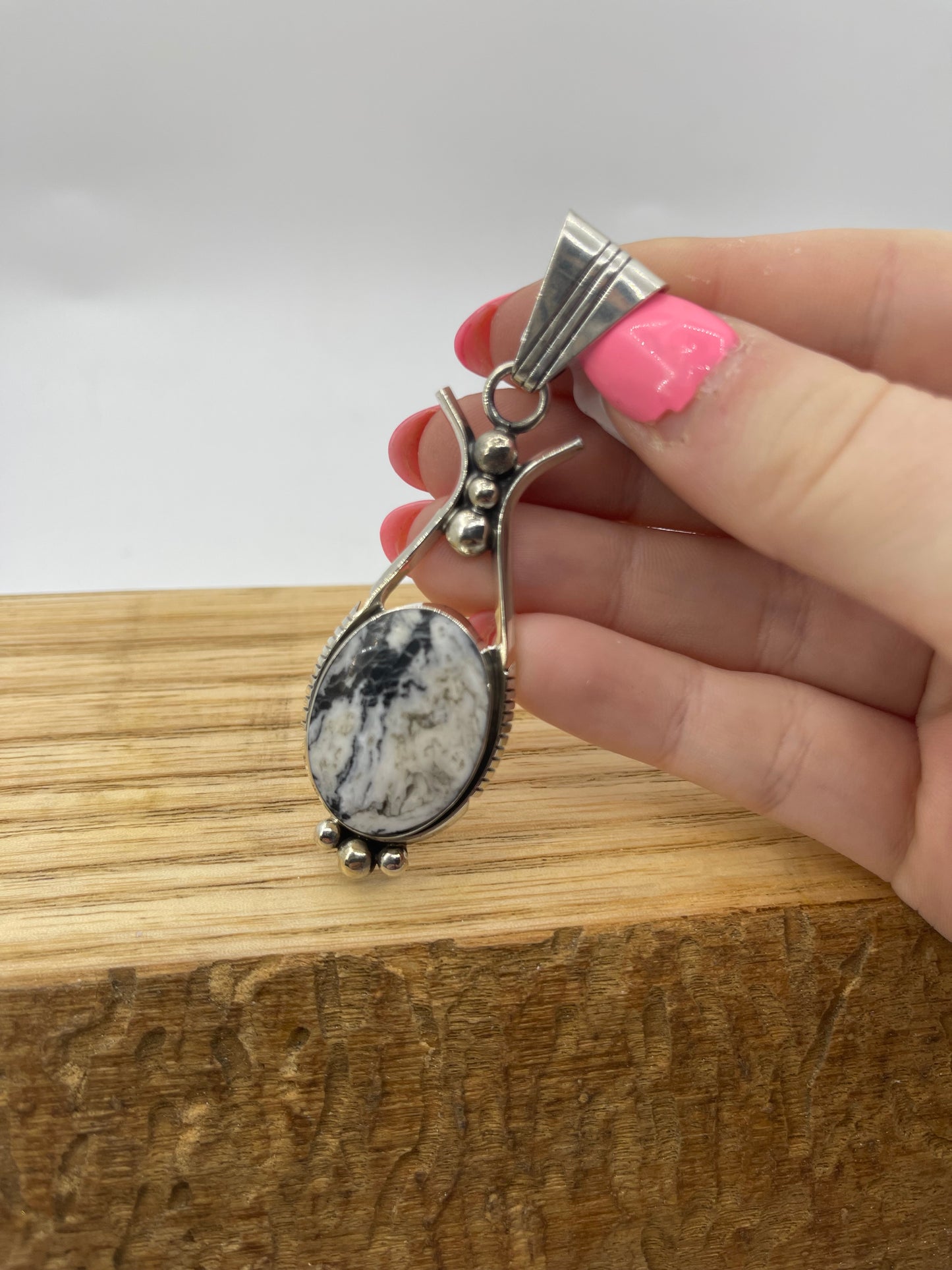 White Buffalo Pendant by Larson Chee, Navajo (Matrix Varies)