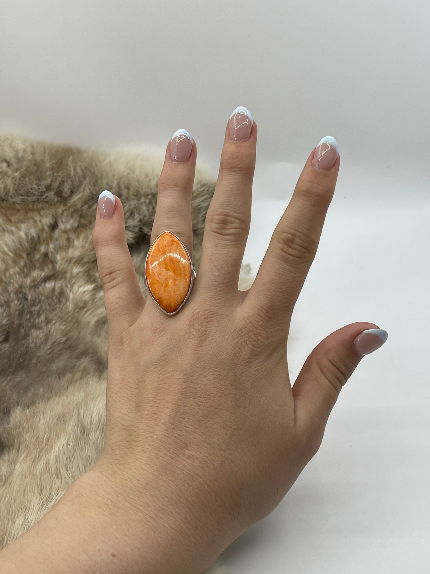 10.0 Orange Spiny Oyster Shell Ring by Lawrence Willie, Navajo