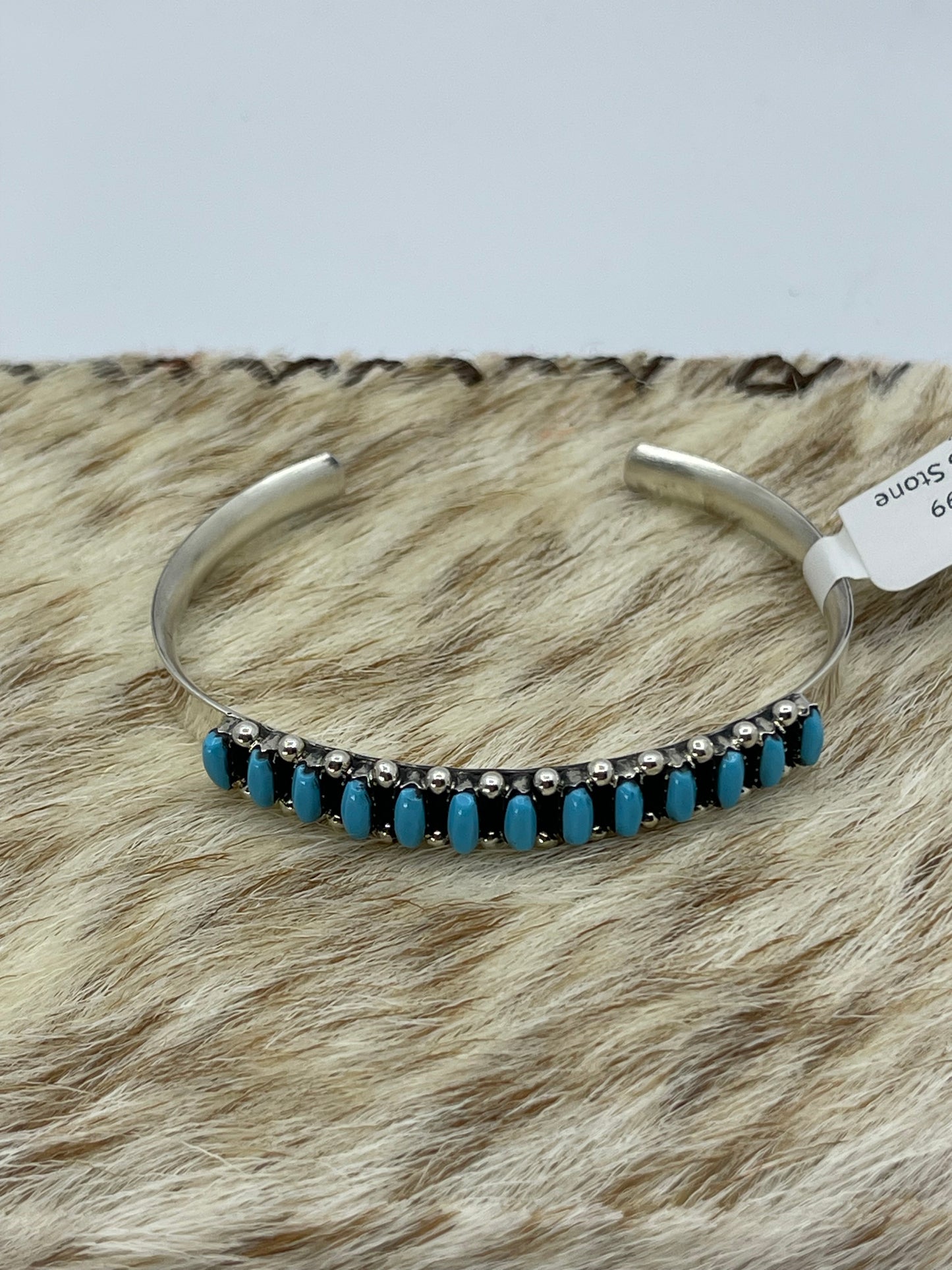 6 1/4" 13 Stone Turquoise Cuff by Victor Martza, Zuni