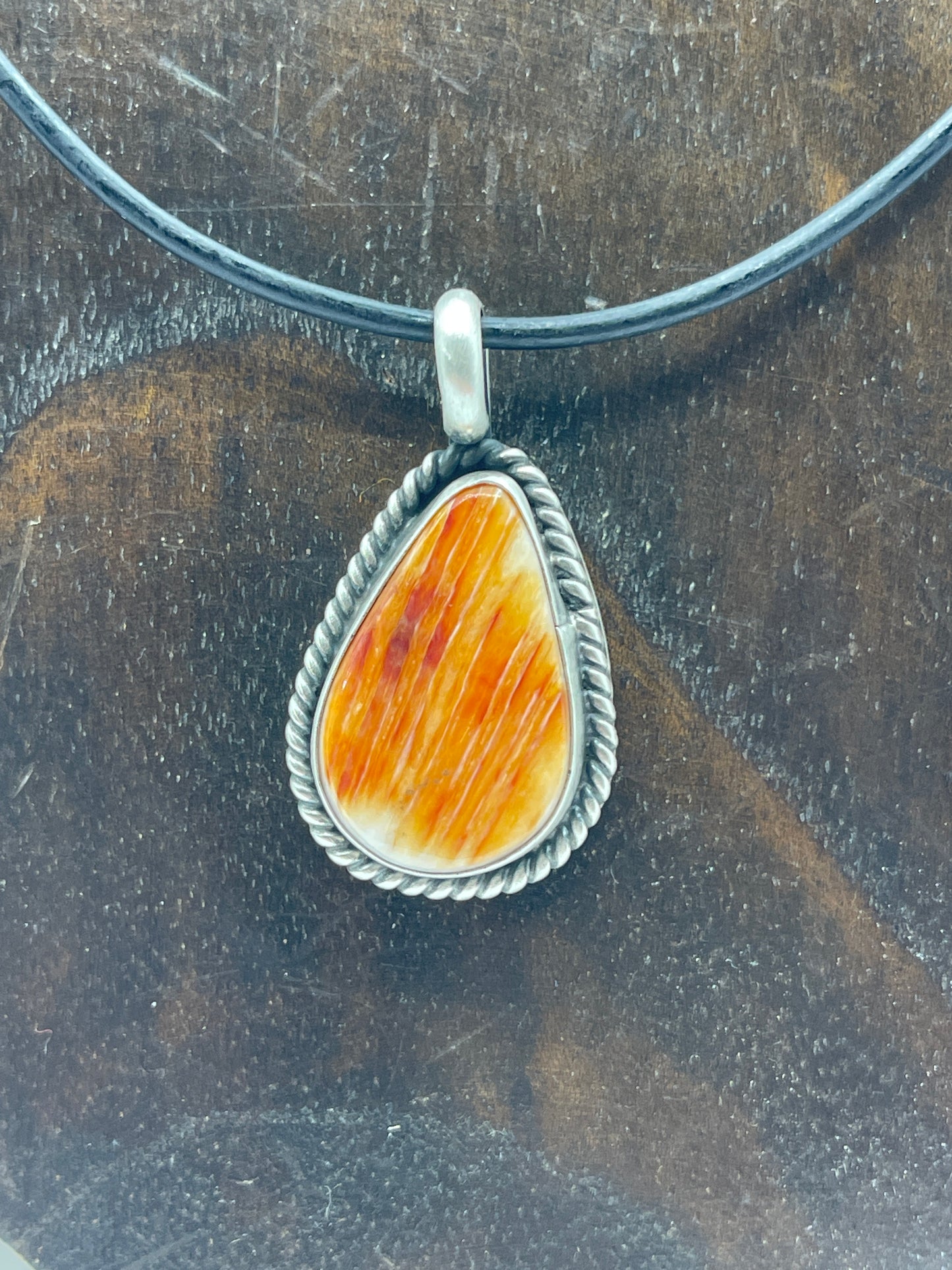 Orange Spiny Oyster Necklace On A Black Leather Cord by Johnny Dixon, Navajo
