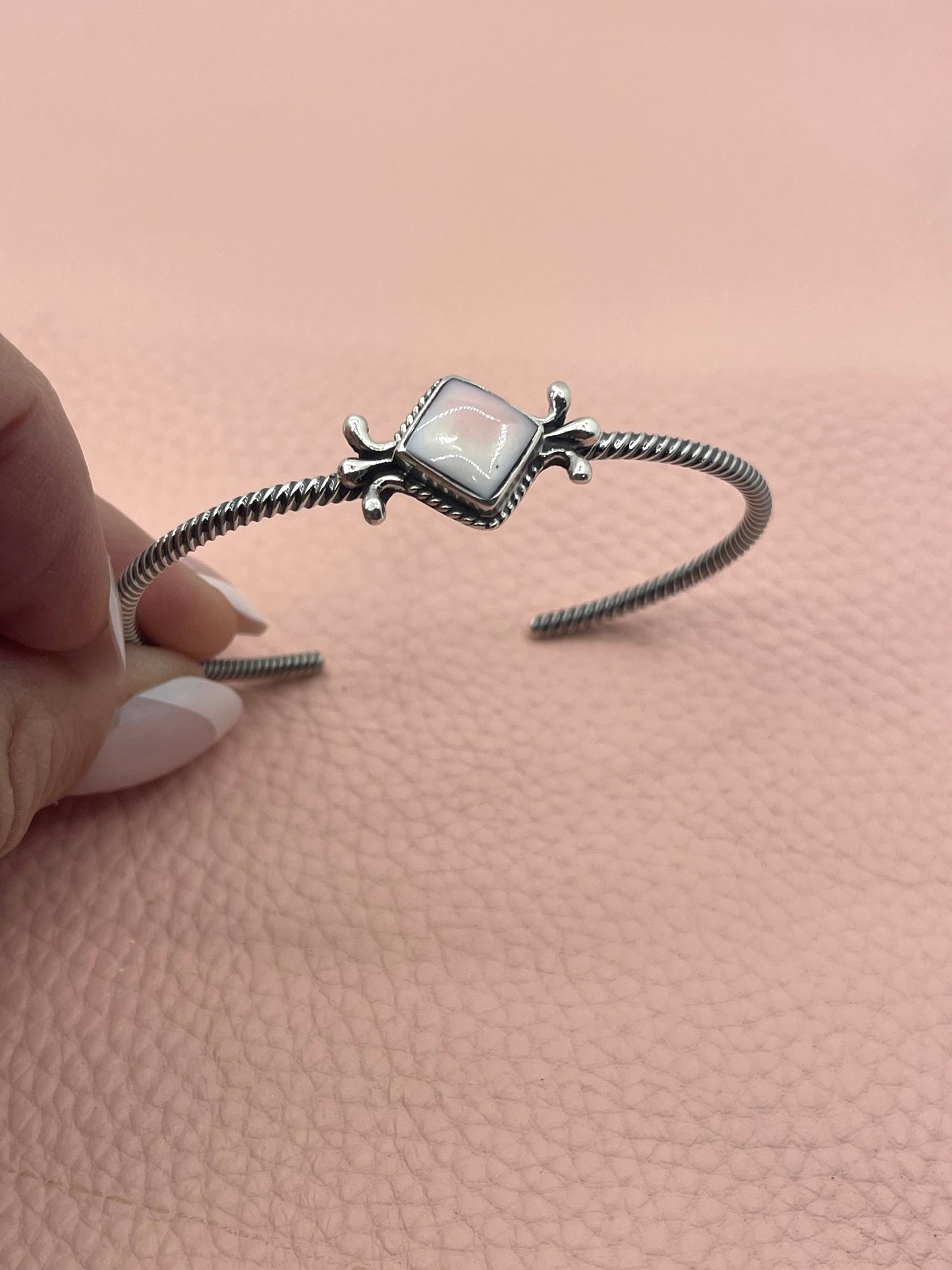 Pink Conch Twisted Wire Cuff by Mike Smith, Navajo