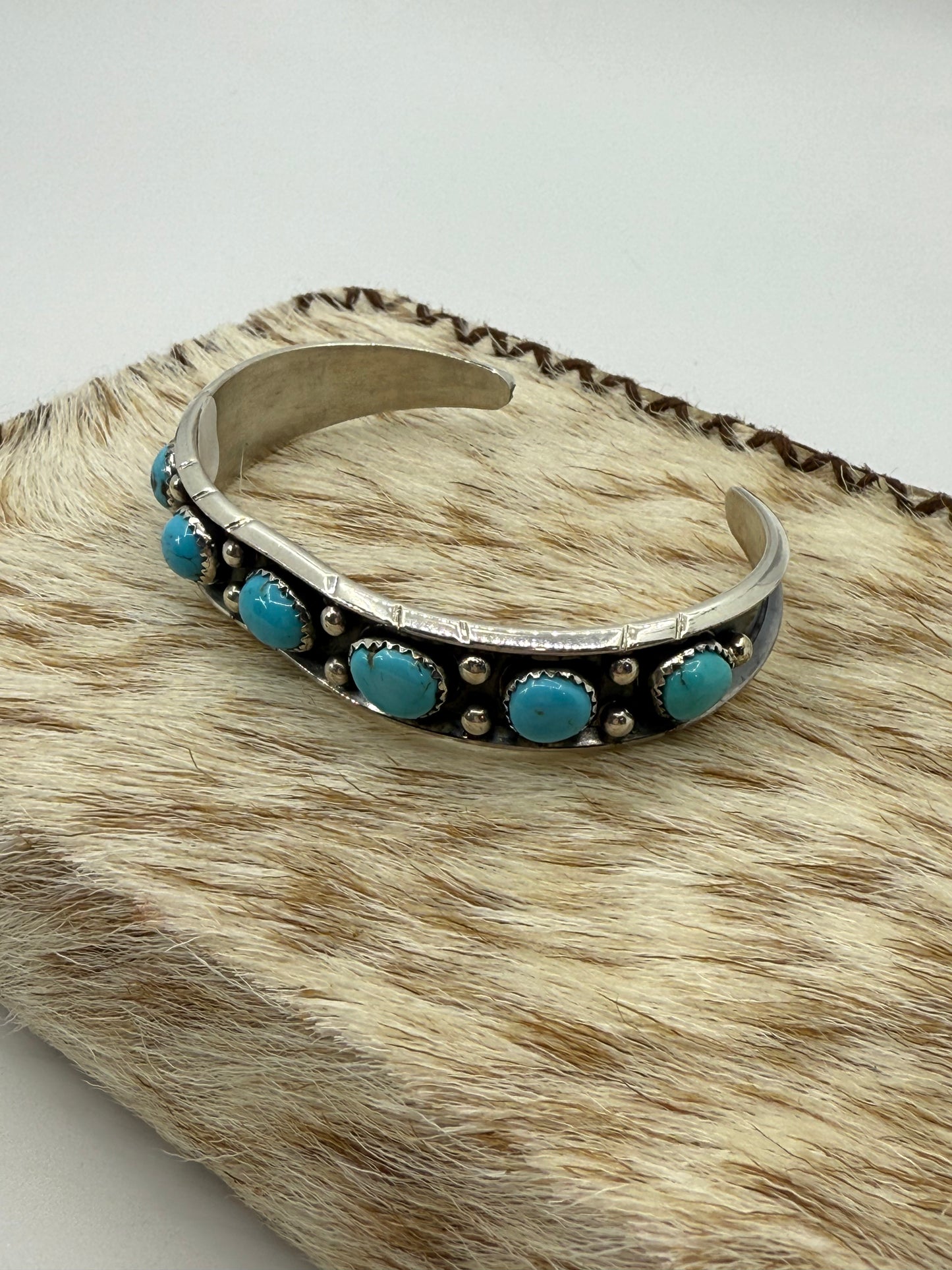 7" 7 Stone Turquoise Cuff by Reed Charley, Navajo