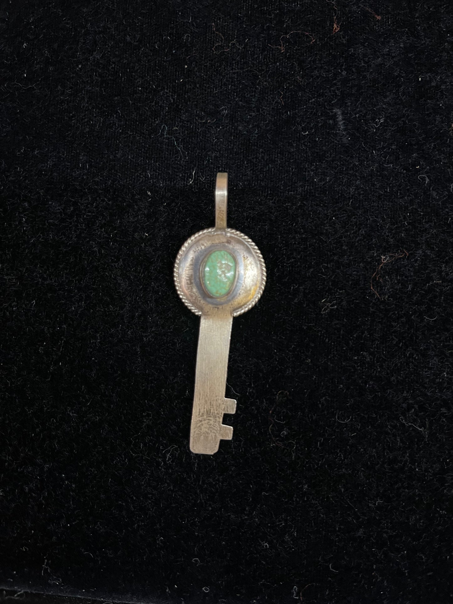 Thunder Mountain Turquoise Cabochon on an Eternity Key Pendant