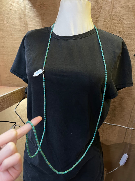 lot 68 3/17 60” Kingman Turquoise Bead Necklace