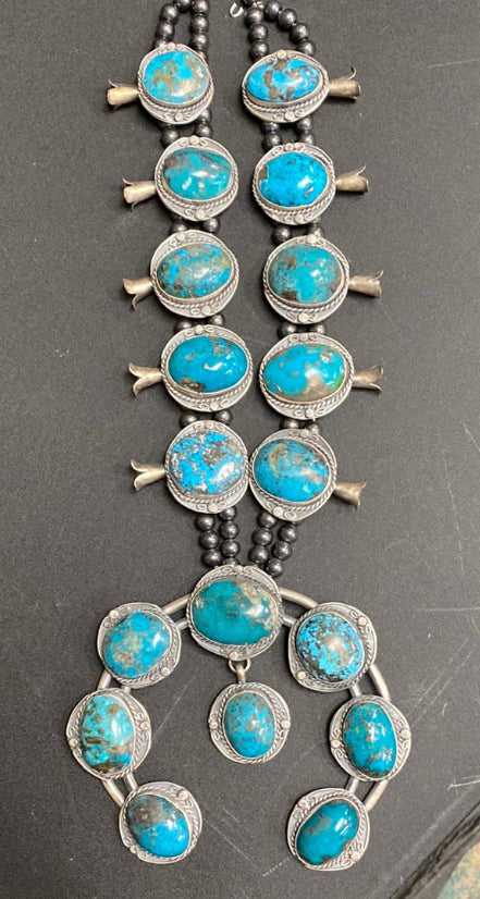 Huge Native American Kingman Turquoise squash blossom necklace by Gilbert Nez