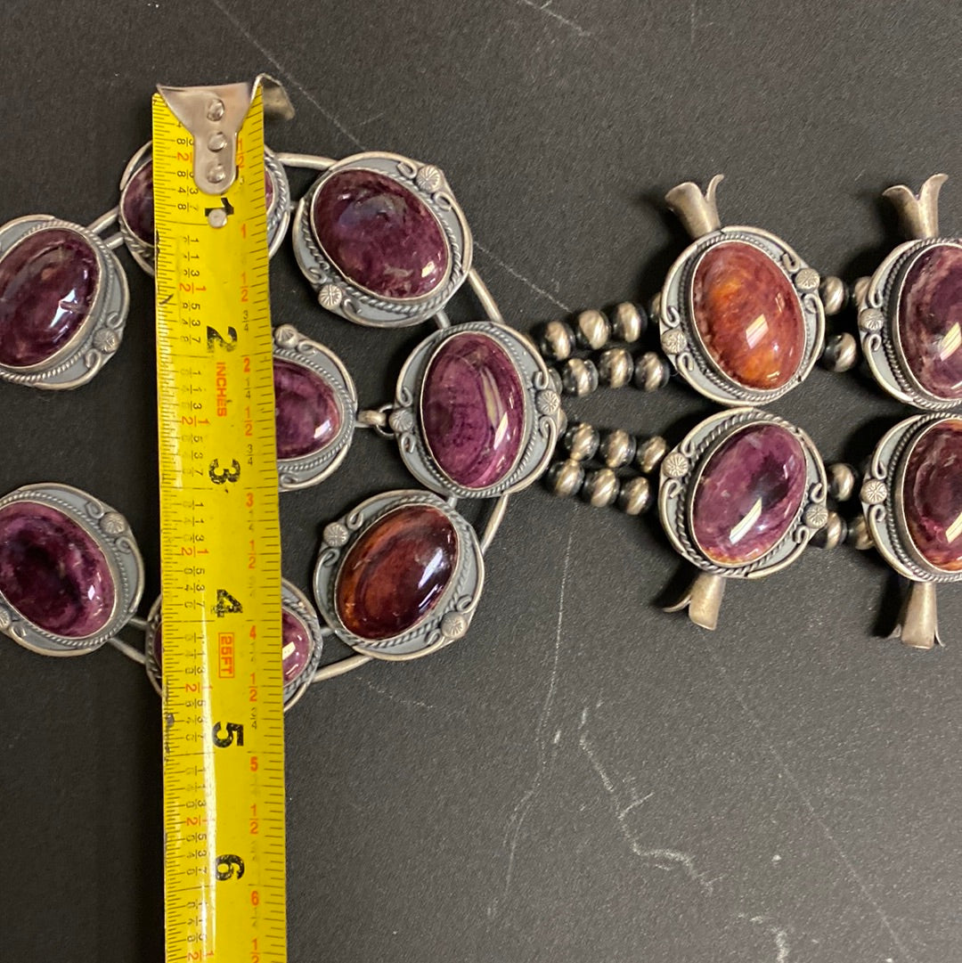 Native American made purple spiney oyster shell squash blossom by Gilbert Nez