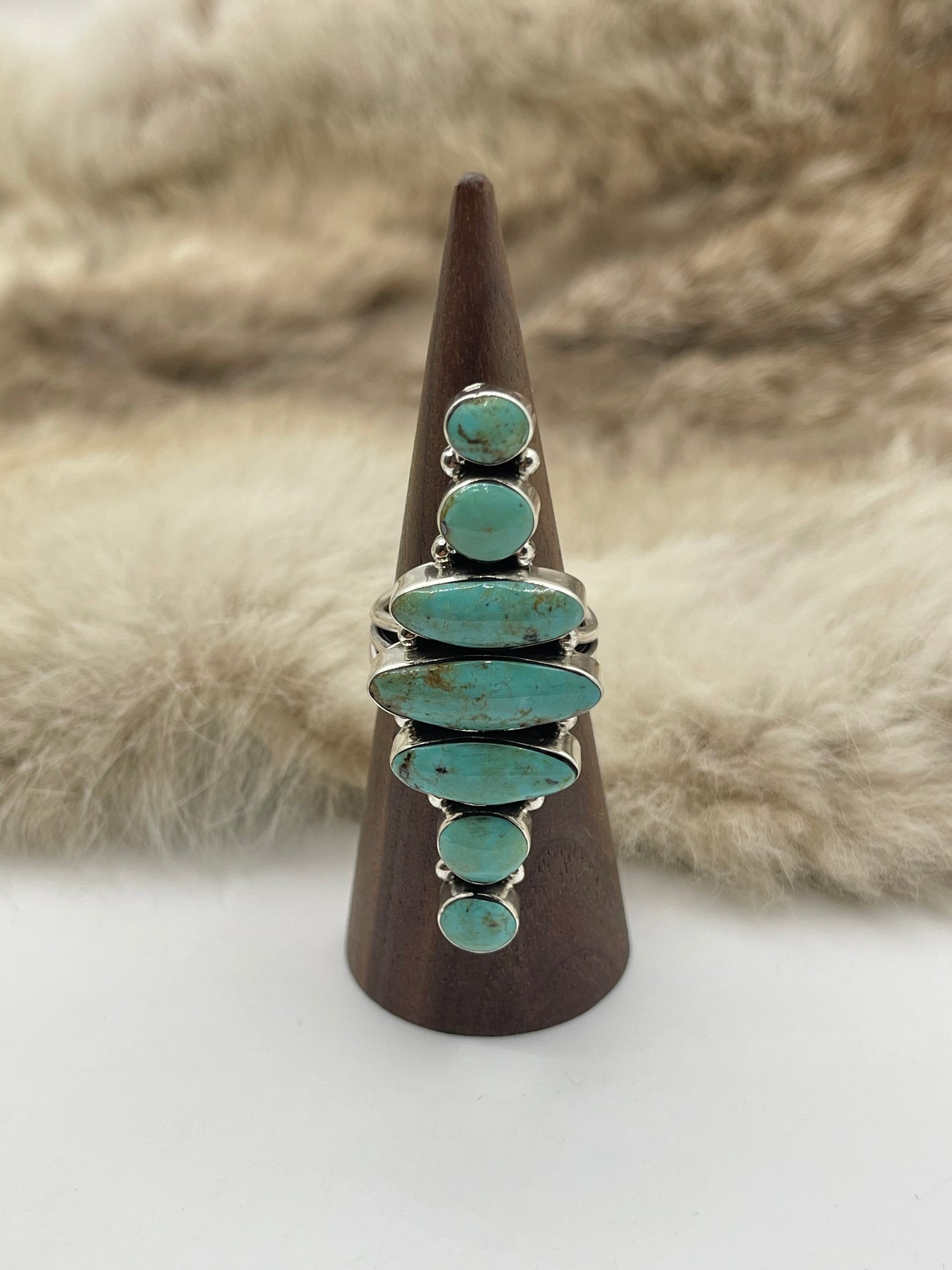 9.0 7 Stone Turquoise Ring by Loretta Delgarito, Navajo
