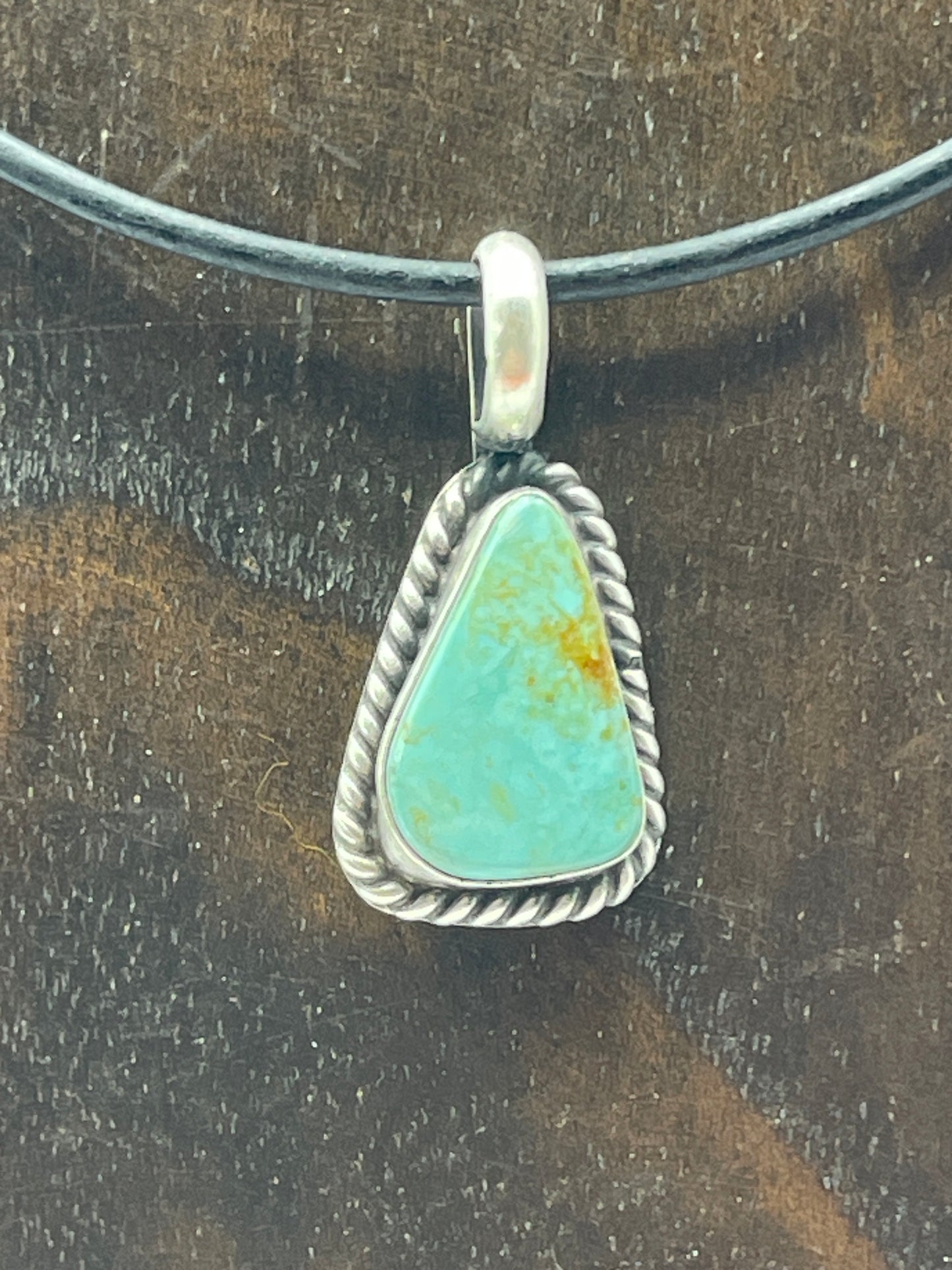Turquoise On A Black Leather Cord Necklace