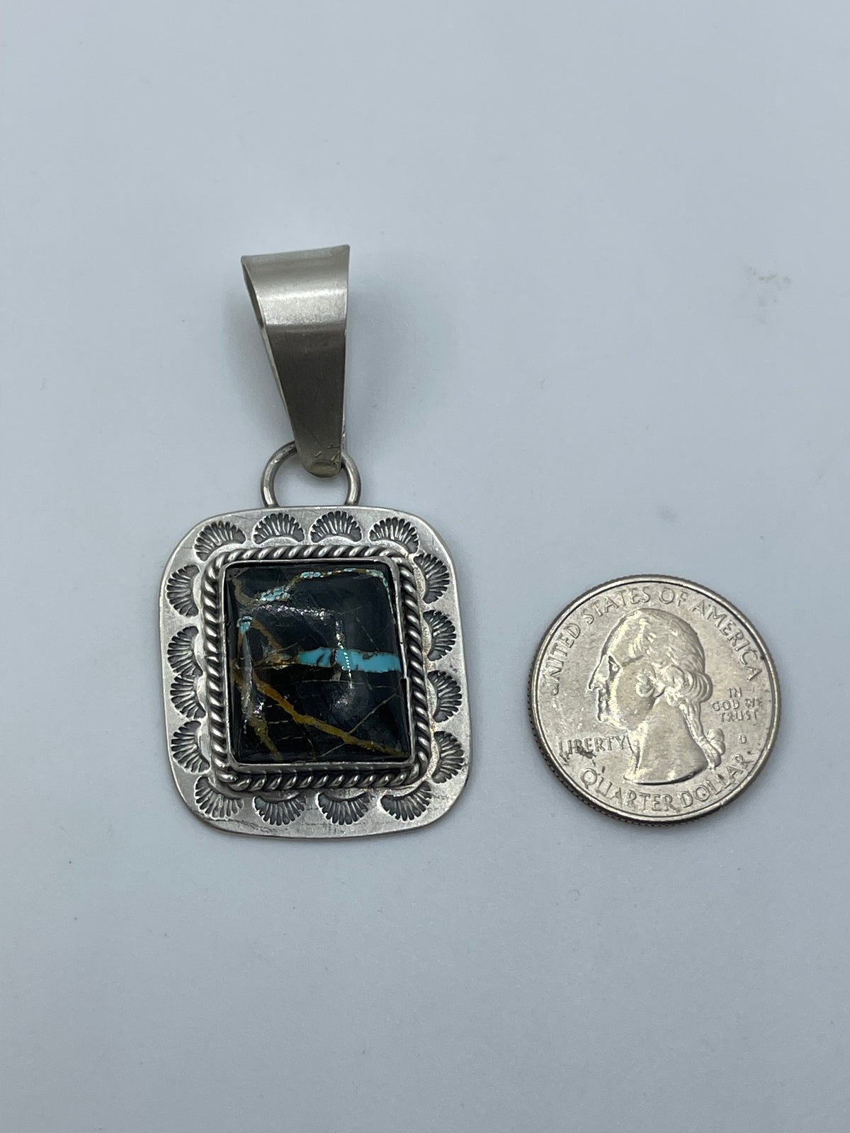 LOT 84 A 9/20 Blackjack Turquoise Pendant by Harold Joe, Navajo