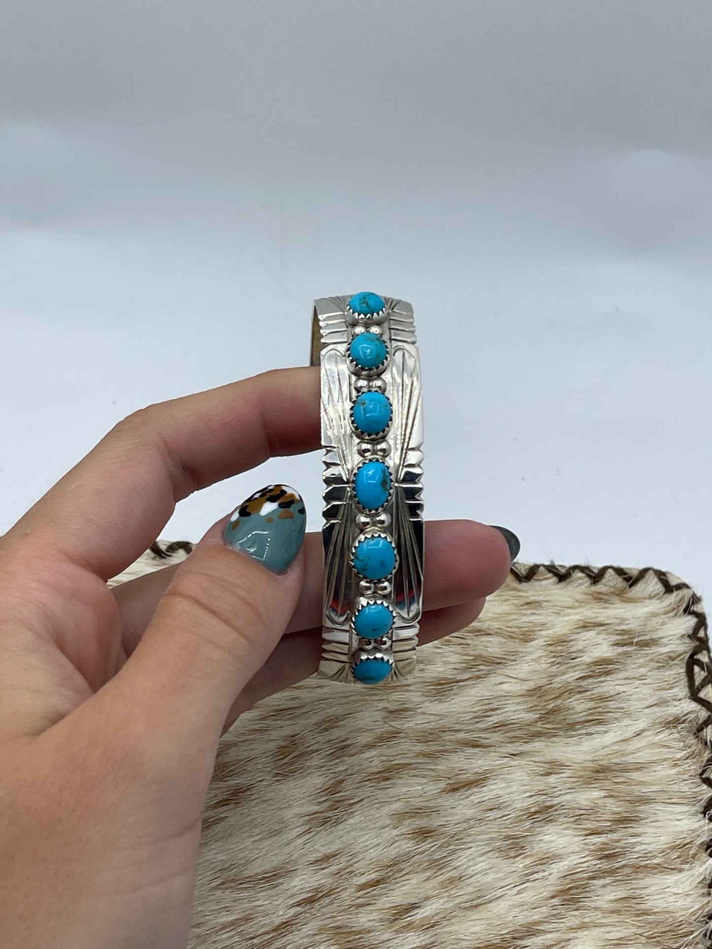 6"-6 3/4" 7 Stone Sleeping Beauty Turquoise Cuff by David Segar, Navajo