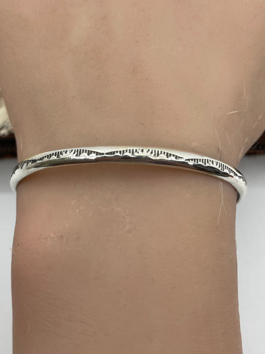 5.75" - 7.25" Stamped Stacker Band by Elaine Tahe, Navajo