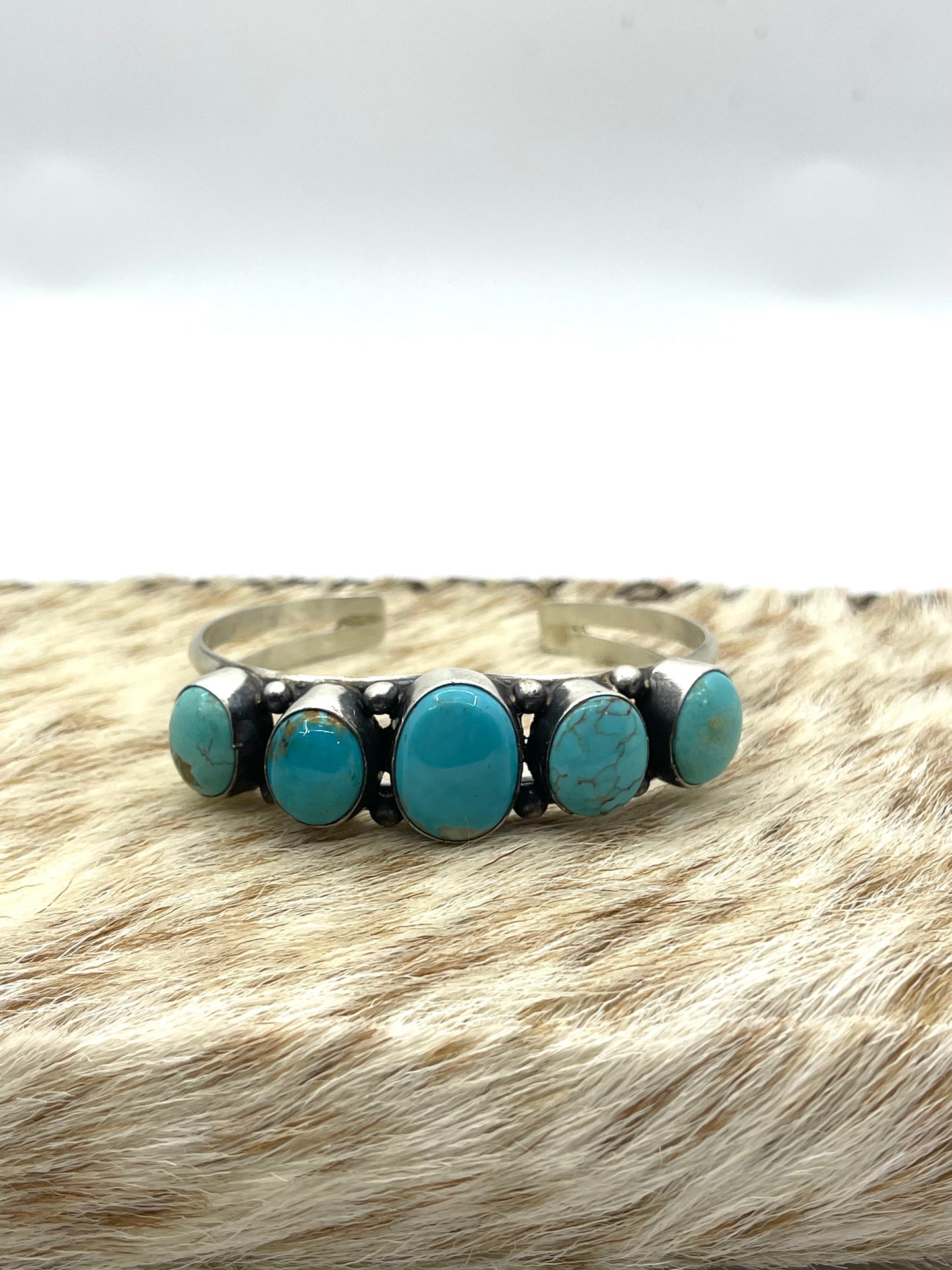 5.5”-7 5 Stone Turquoise Cuff by Augustine Largo, Navajo
