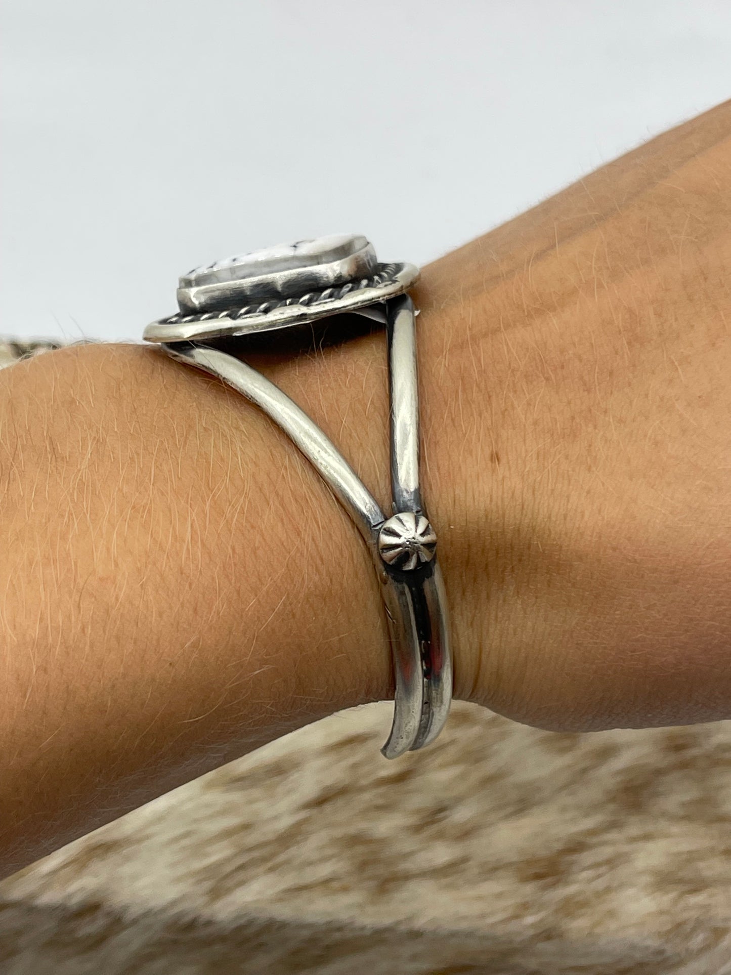 5 1/2"-7 1/2" White Buffalo Triangle Cuff by Johnny Dixon, Navajo