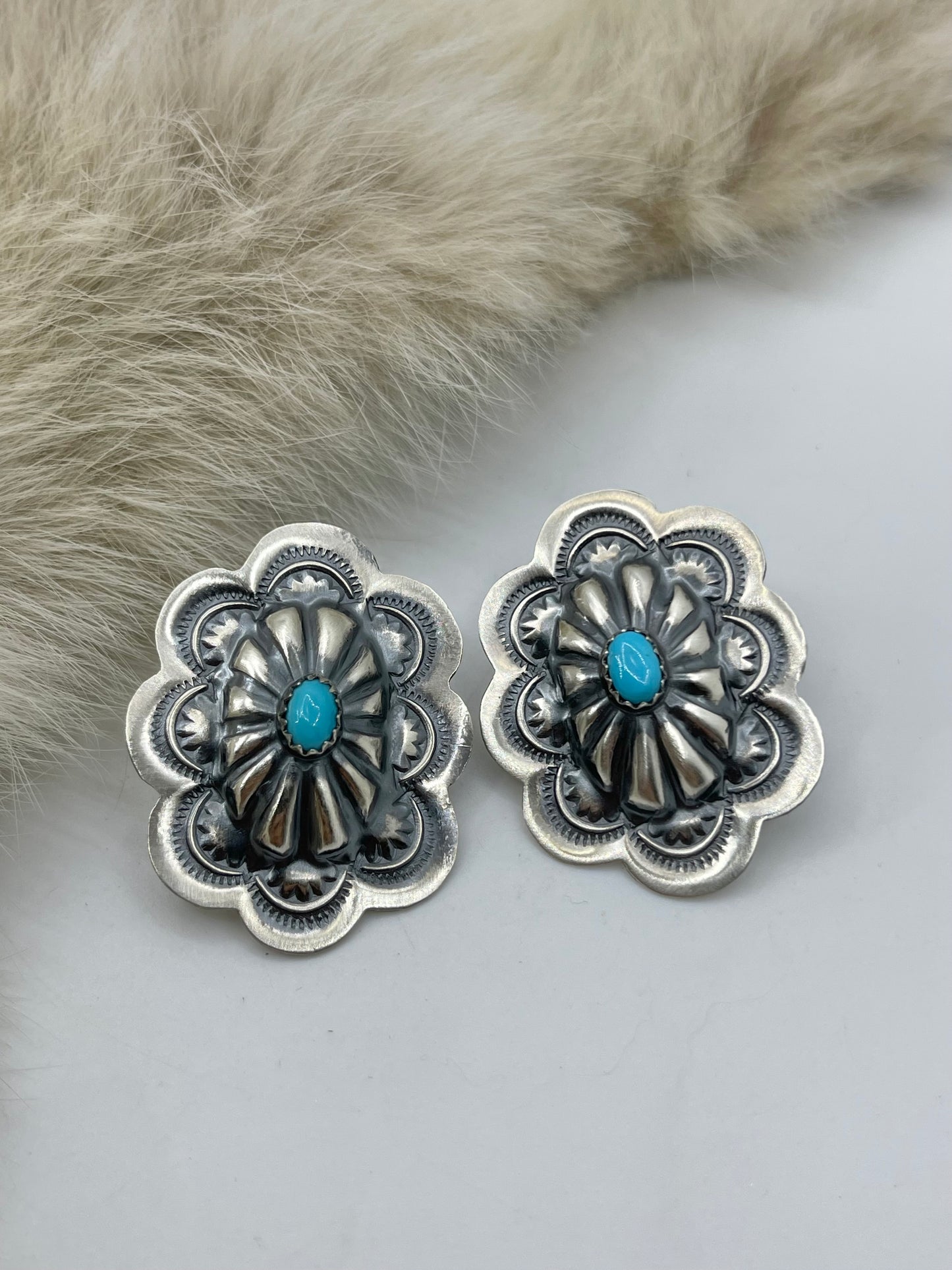 Stamped Oval Concho Earrings by Lavina Benally, Navajo