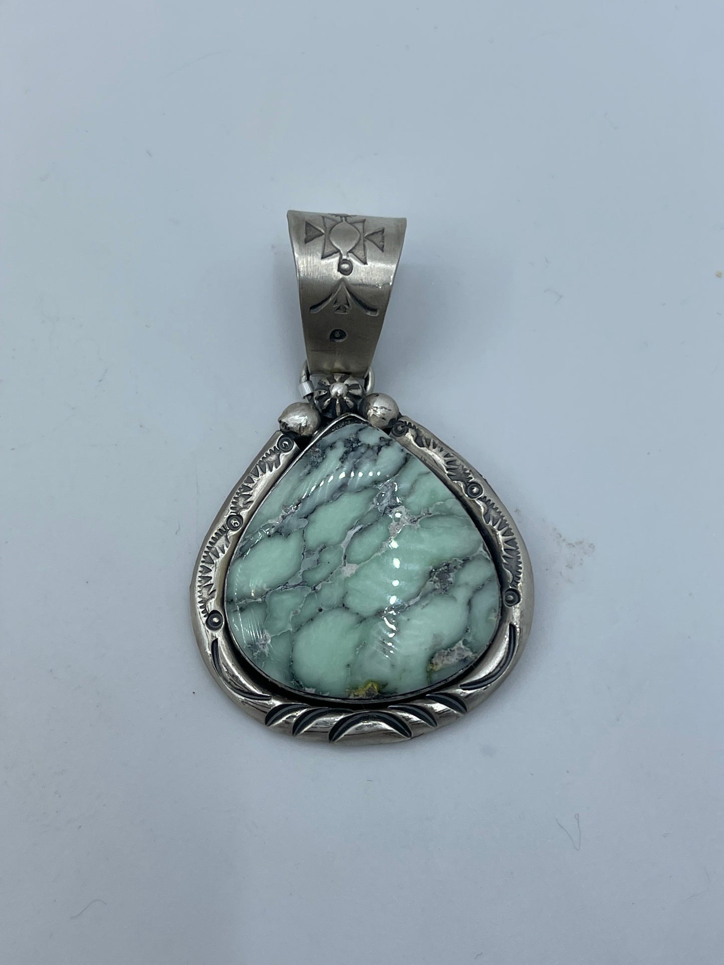 Palomino Turquoise Pendant by J. Piaso, Jr., Navajo