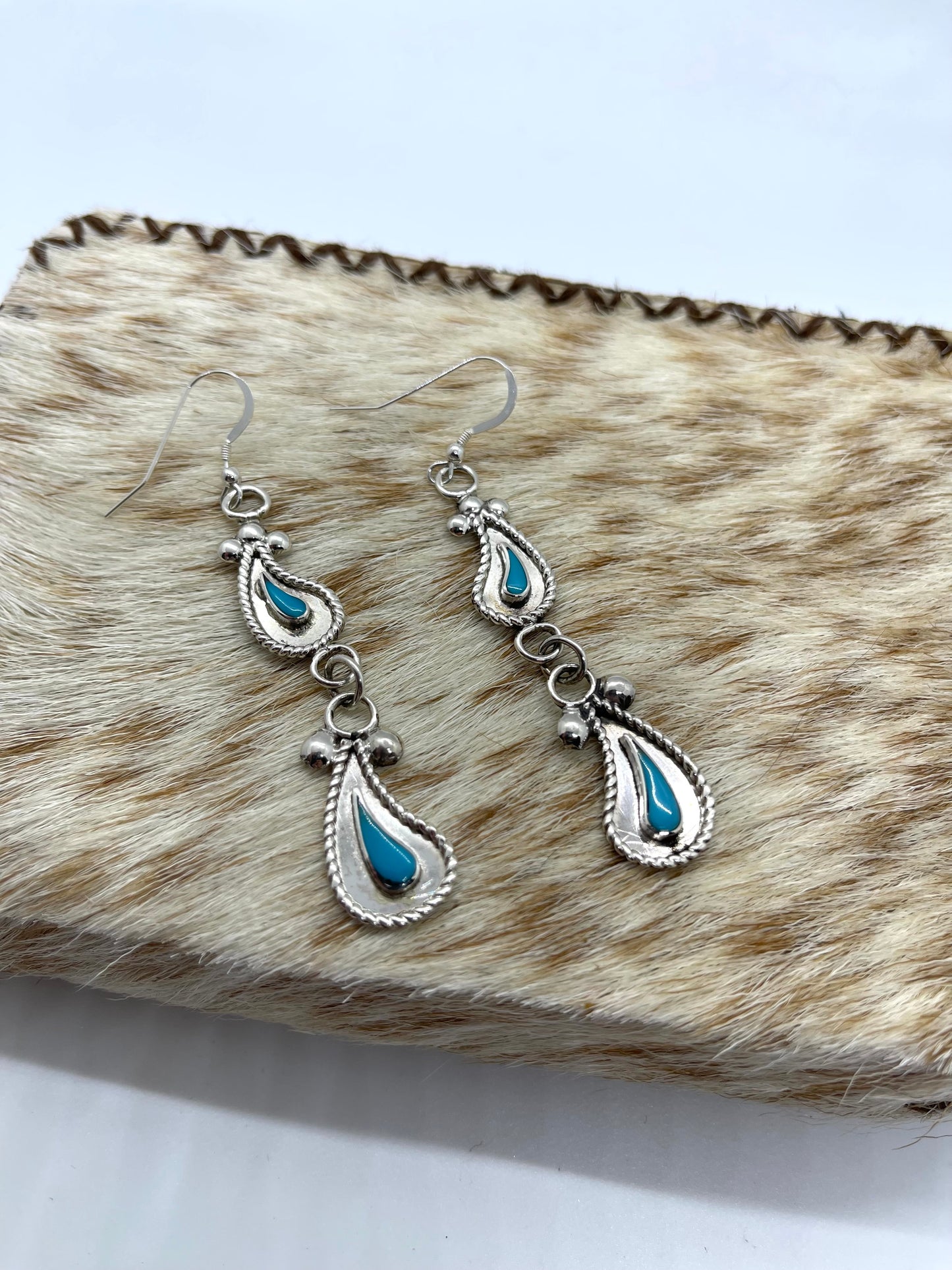 Turquoise and Silver Paisley Dangle Earrings by Gilbert Weebothee, Zuni