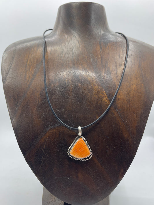 Orange Spiny Oyster Shell on Black Leather Cord by Johnny Dixon , Navajo
