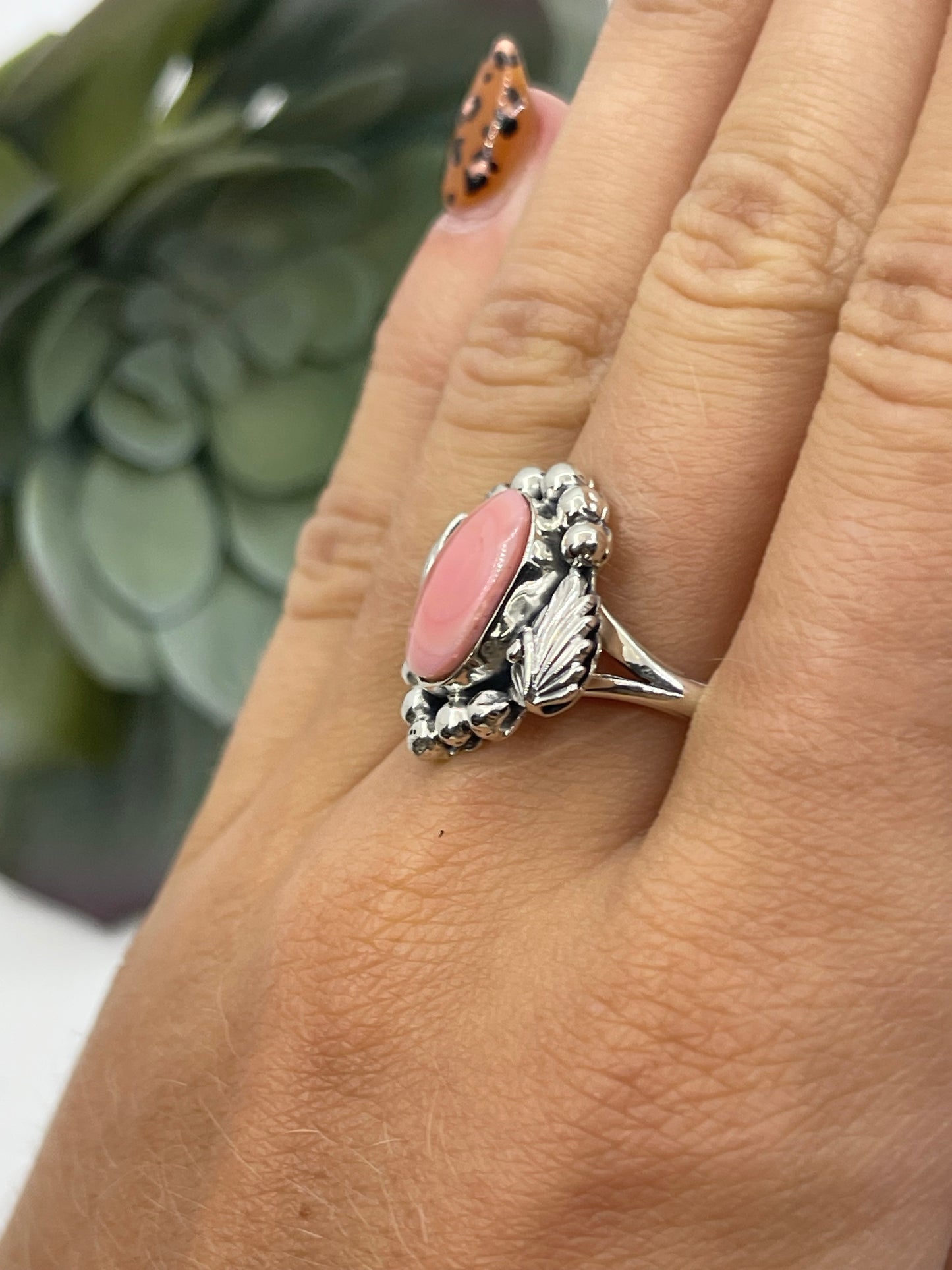 11.0 Pink Conch Shell Oval Ring by Sadie Jim, Navajo