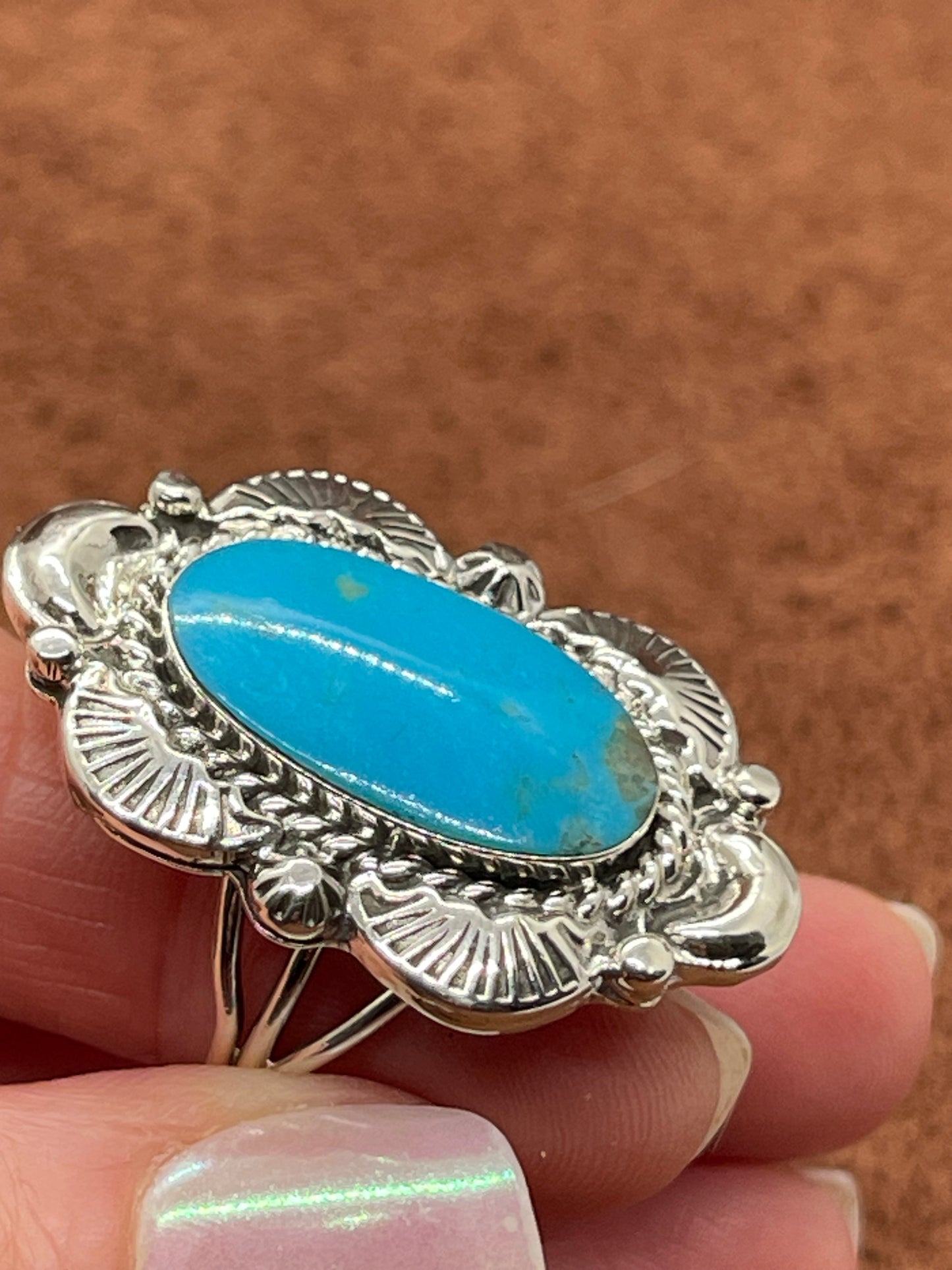 10.0 Turquoise Oval Ring by Daniel Dakai, Navajo