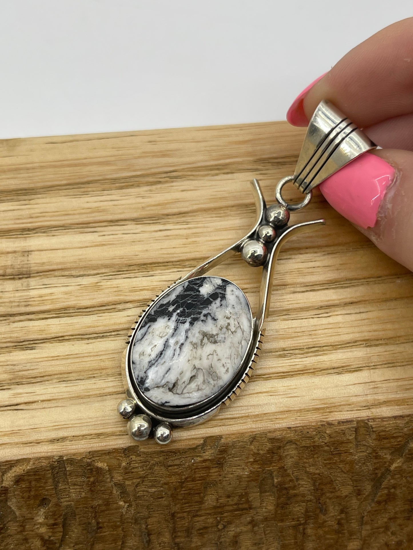 White Buffalo Pendant by Larson Chee, Navajo (Matrix Varies)