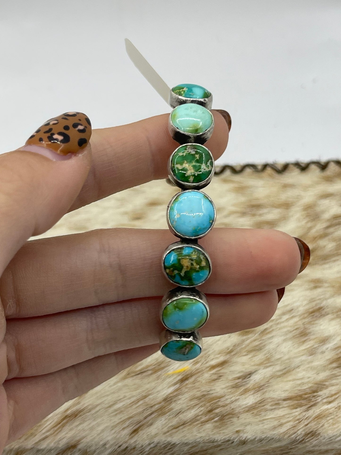5 1/4”-7” 7 Stone Sonoran Gold Turquoise Cuff by Tom Lewis, Navajo