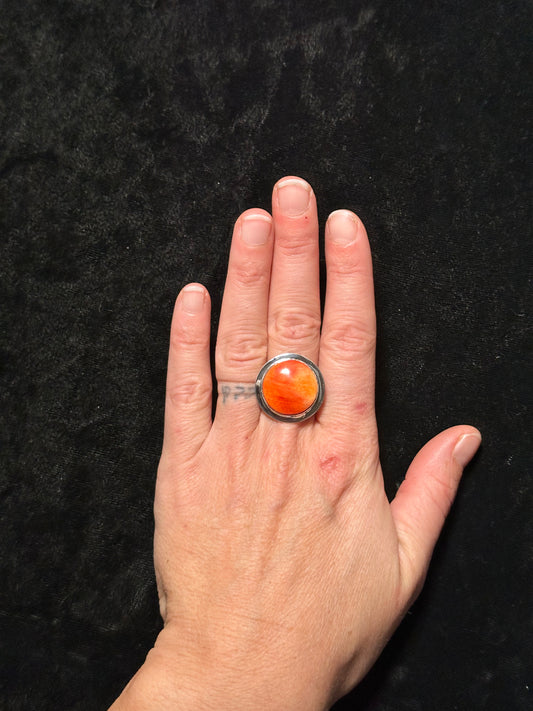 9.0 Orange Spiney Ring with Silver Overlay Band by Marie Jackson, Navajo