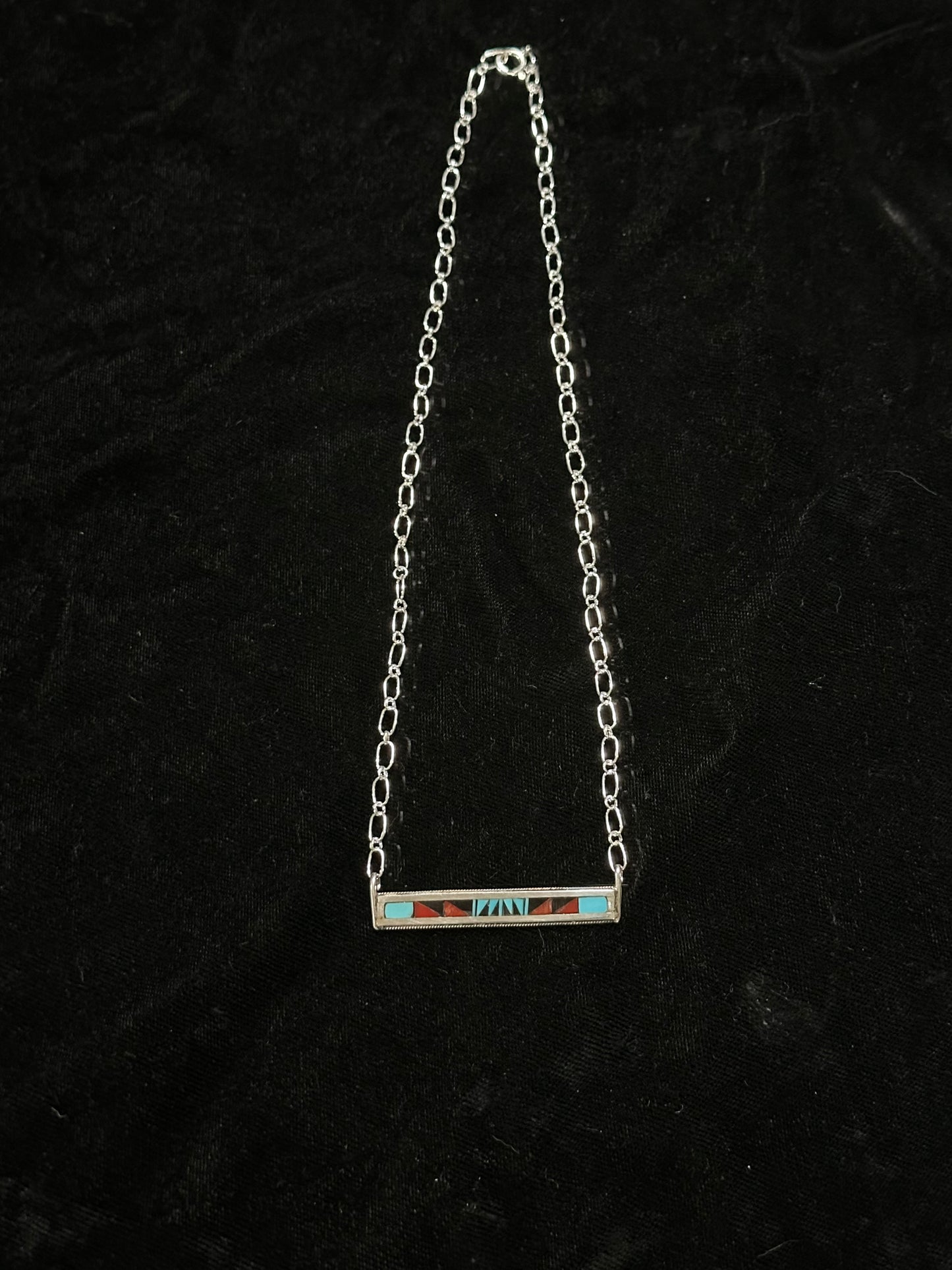 Sleeping Beauty Turquoise, Black Onyx, and Coral Inlay Bar Necklace by Phil and Rachel Weahkee, Zuni