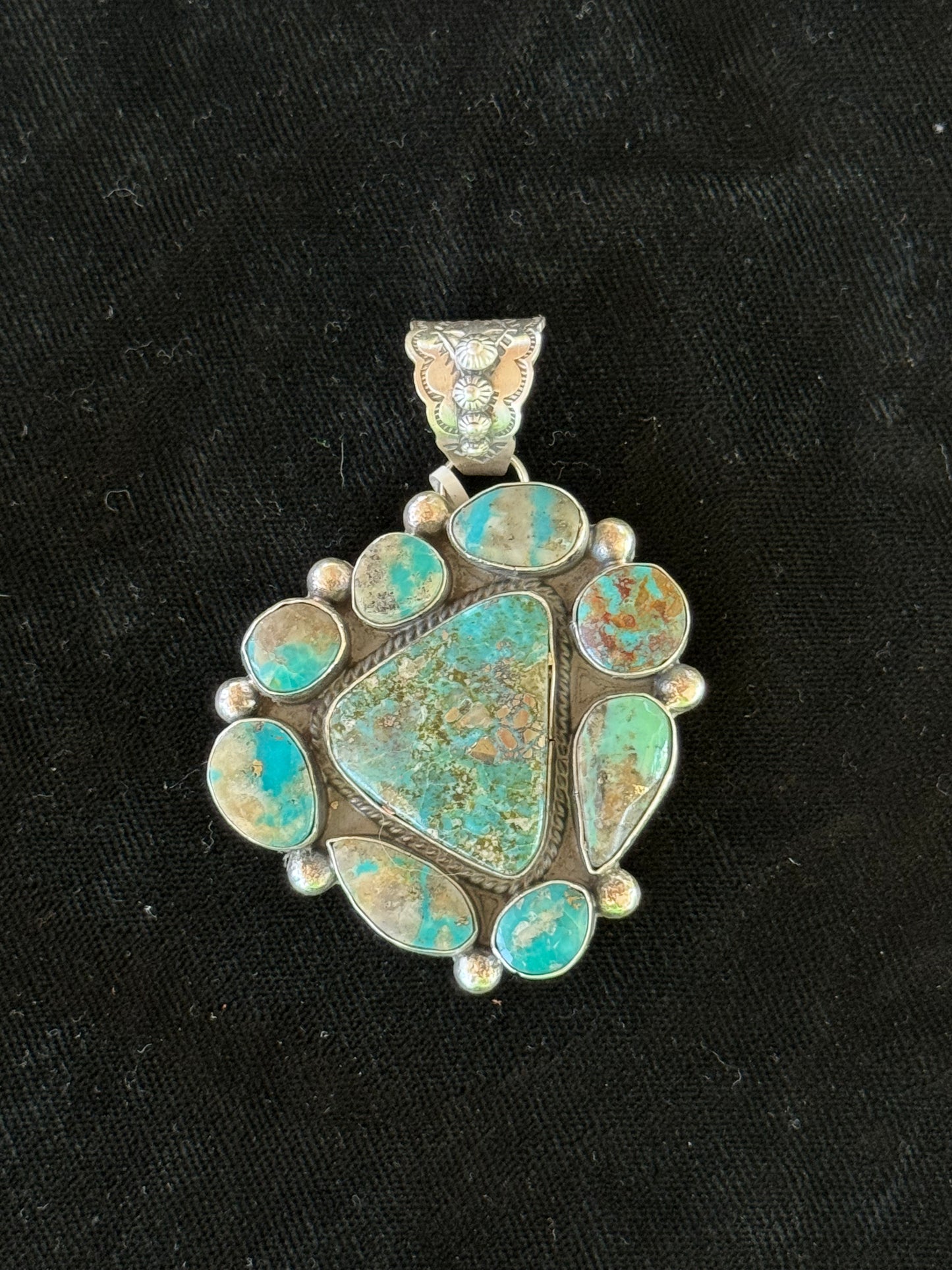 Campitos Turquoise Pendant by T. Nez Sr., Navajo