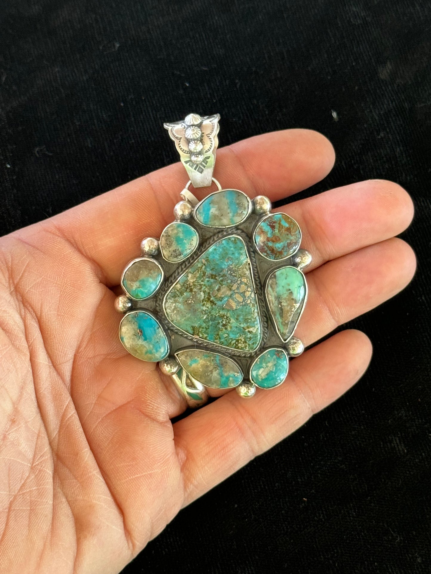 Campitos Turquoise Pendant by T. Nez Sr., Navajo