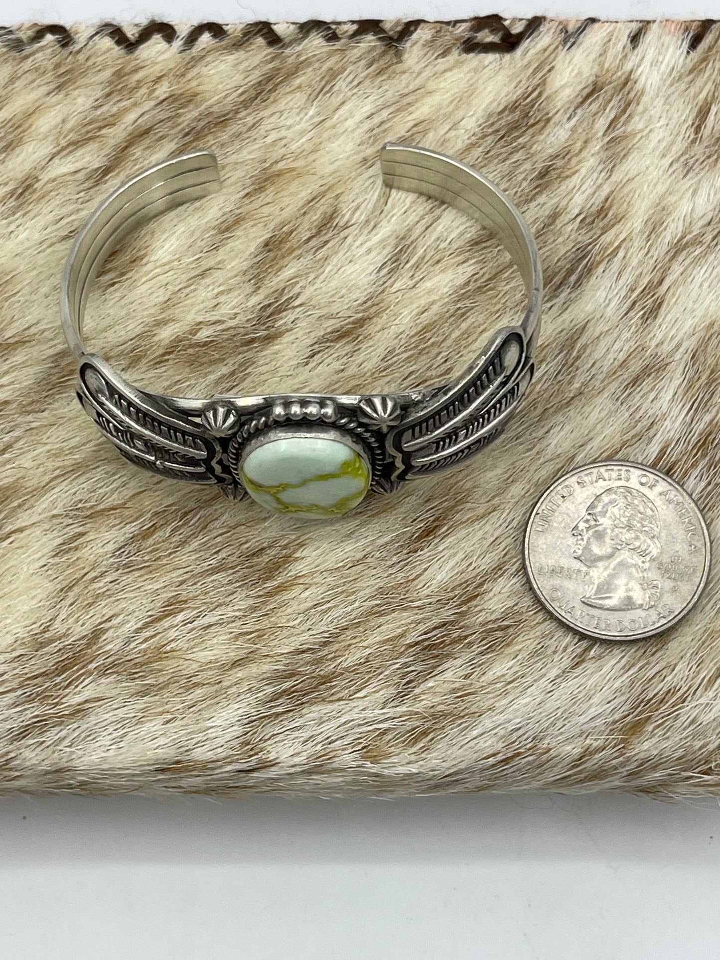 5 3/4"-7 3/4" Palomino Cuff with Feather by Daniel Benally, Navajo (Matrix Varies)