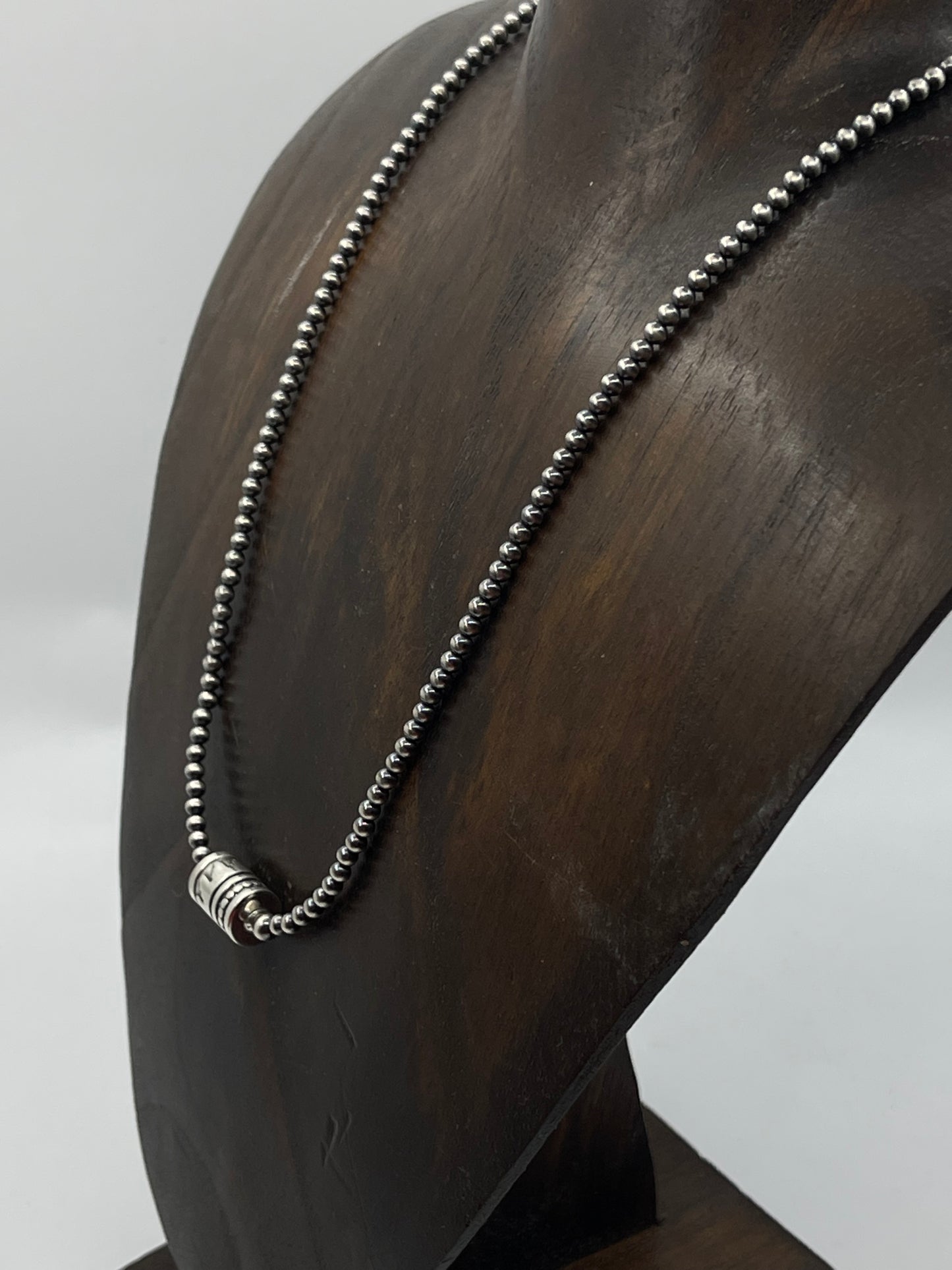 17 1/2" 3mm Navajo Pearls and 9mm Stamped Barrel Bead Necklace