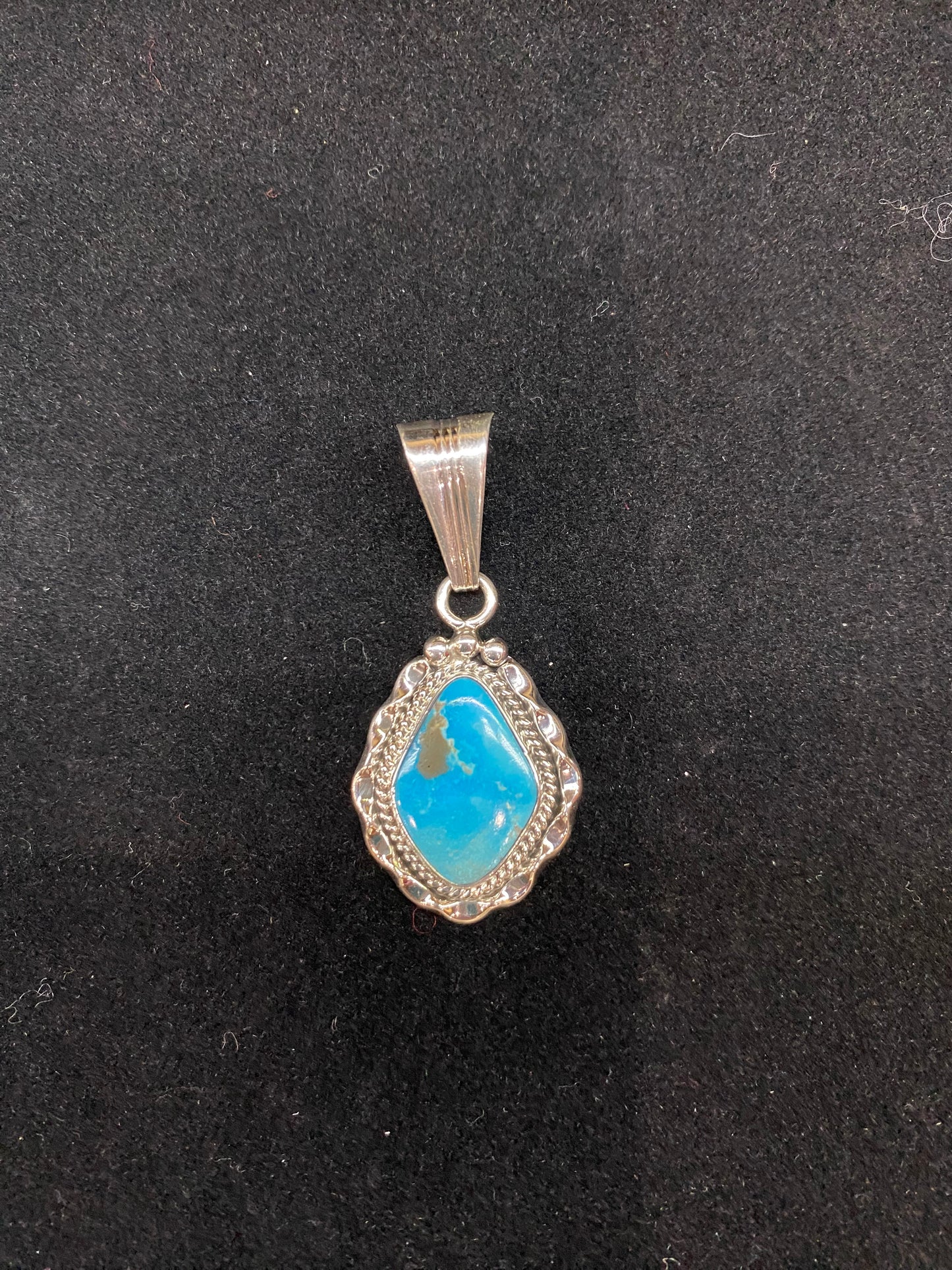 Turquoise Pendant by Samuel Yellowhair, Navajo