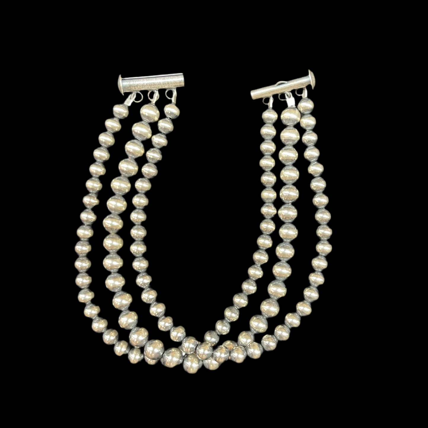 6 3/4" 3 Strand 4mm, and 5mm Navajo Pearl Bracelet