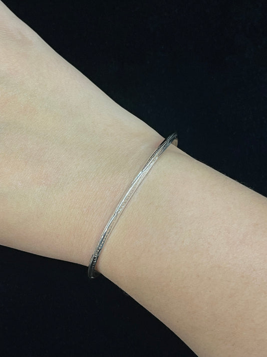 6"-7" Sterling Silver Triangle Stamped Cuff by Elaine Tahe, Navajo