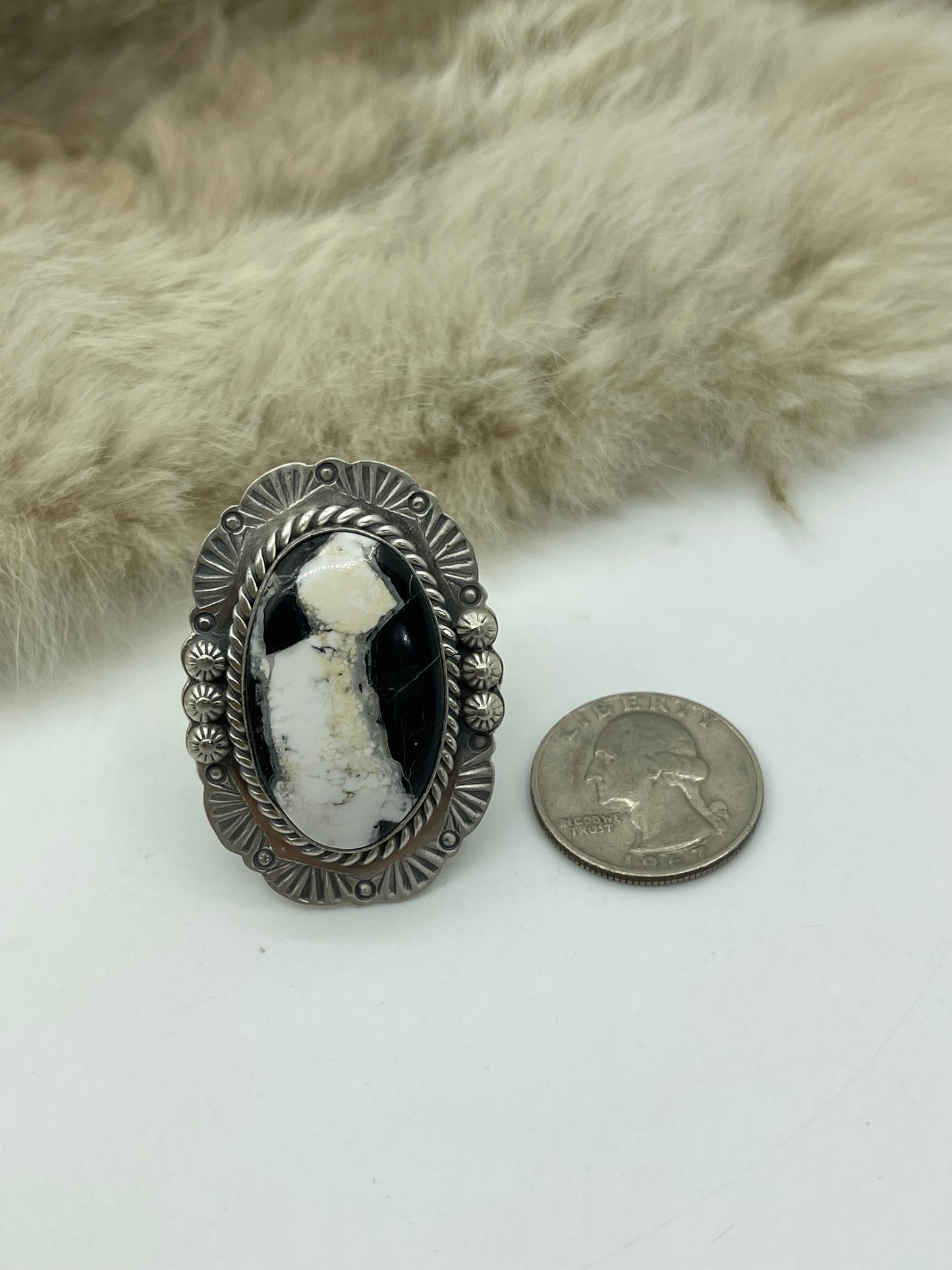 Adjustable 7.0-10.0 White Buffalo Ring with Stamped "L" by Artist