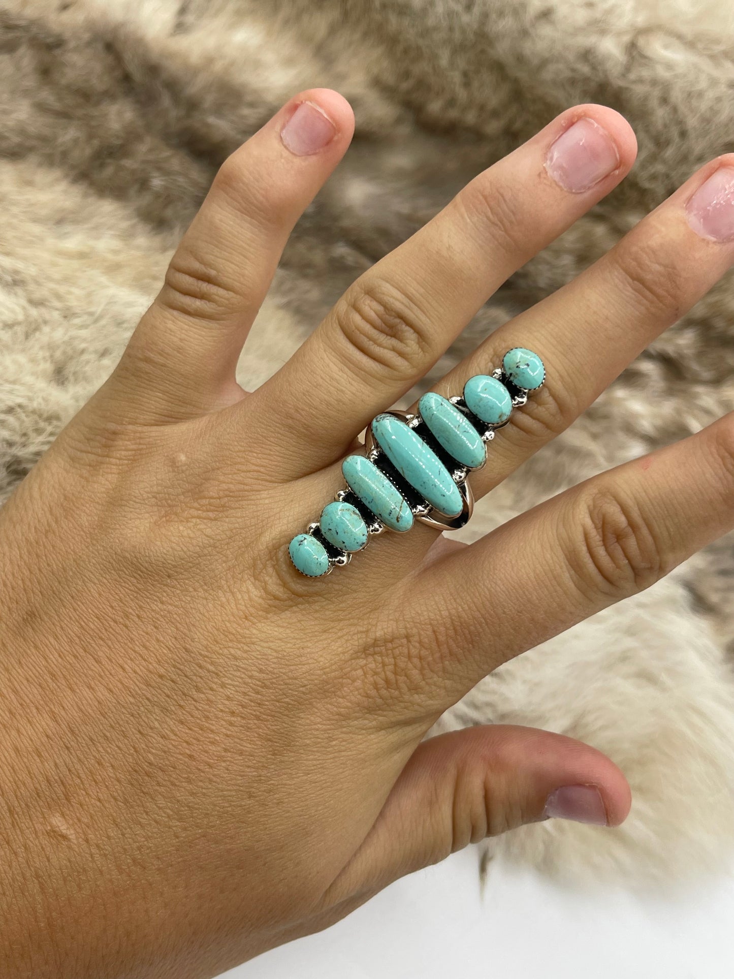 10.0 7 Stone Turquoise Ring by Loretta Delgarito, Navajo