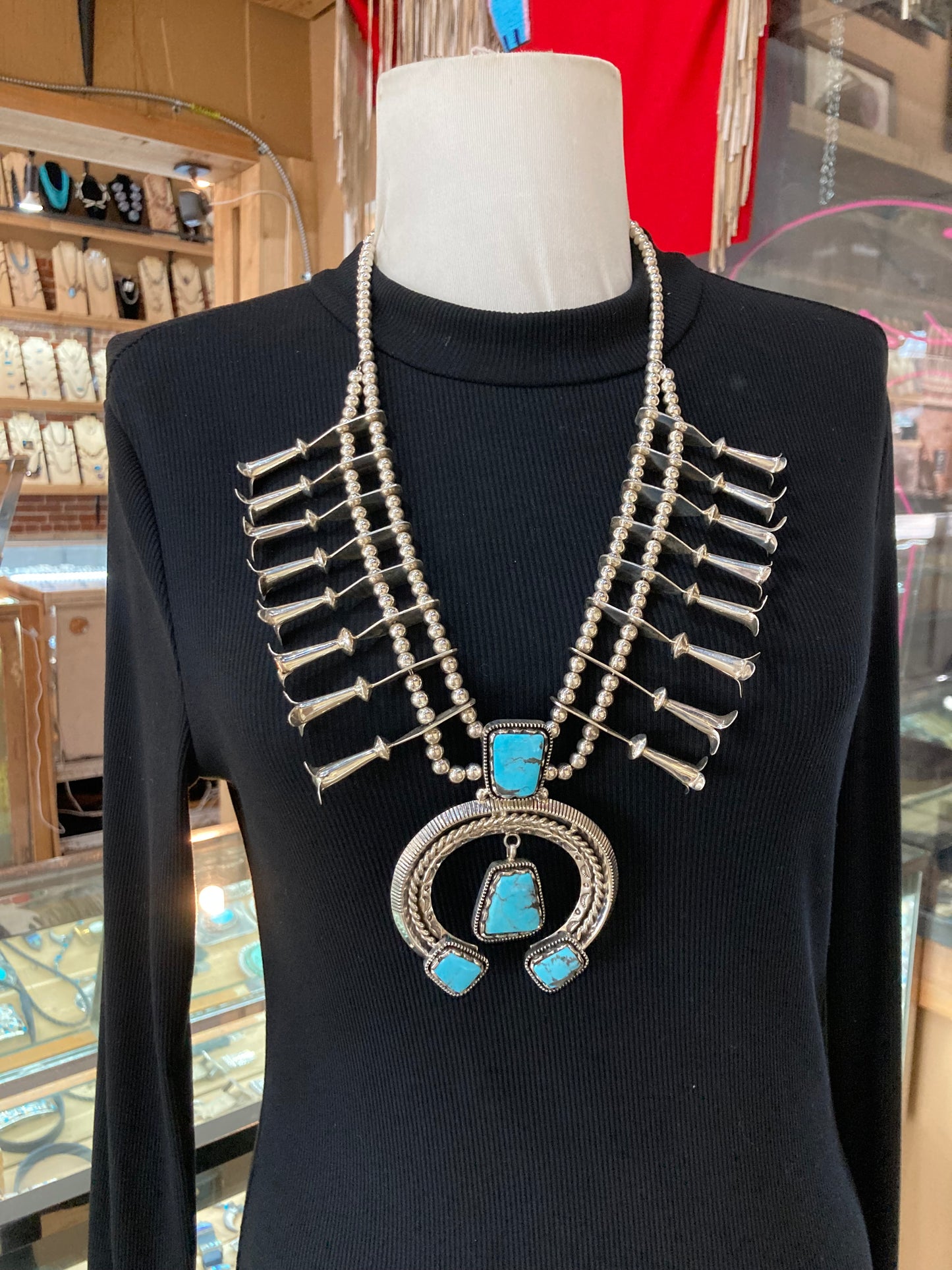 24" Blue Turquoise High Shine Squash Blossom by Emerson Delgarito, Navajo