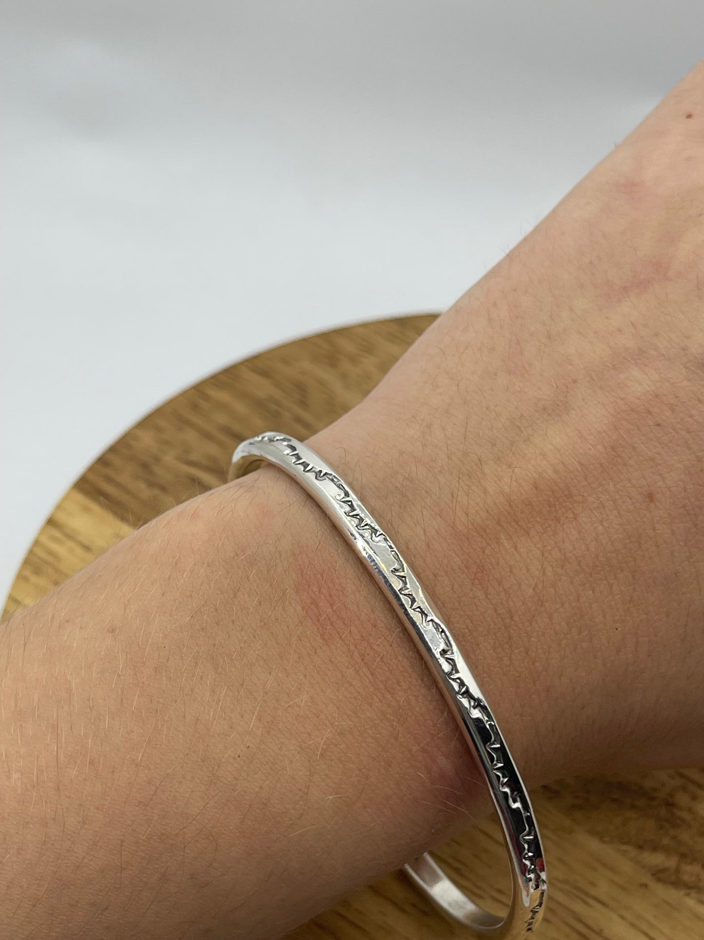 Stamped Round Wire Stacker Cuff by Elaine Tahe, Navajo (Stamping varies)