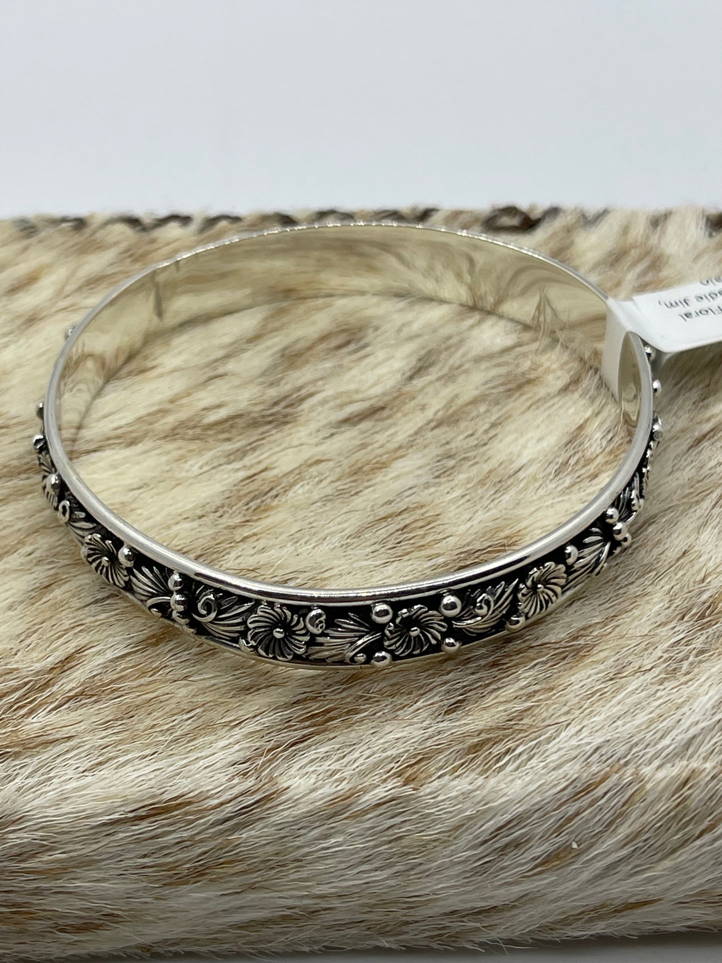 8 1/4" Silver Floral Bangle by Sadie Jim, Navajo