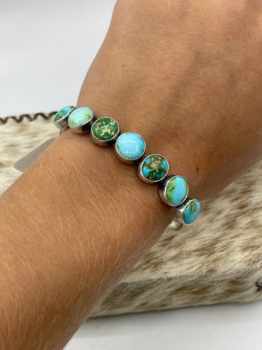 5 1/4”-7” 7 Stone Sonoran Gold Turquoise Cuff by Tom Lewis, Navajo