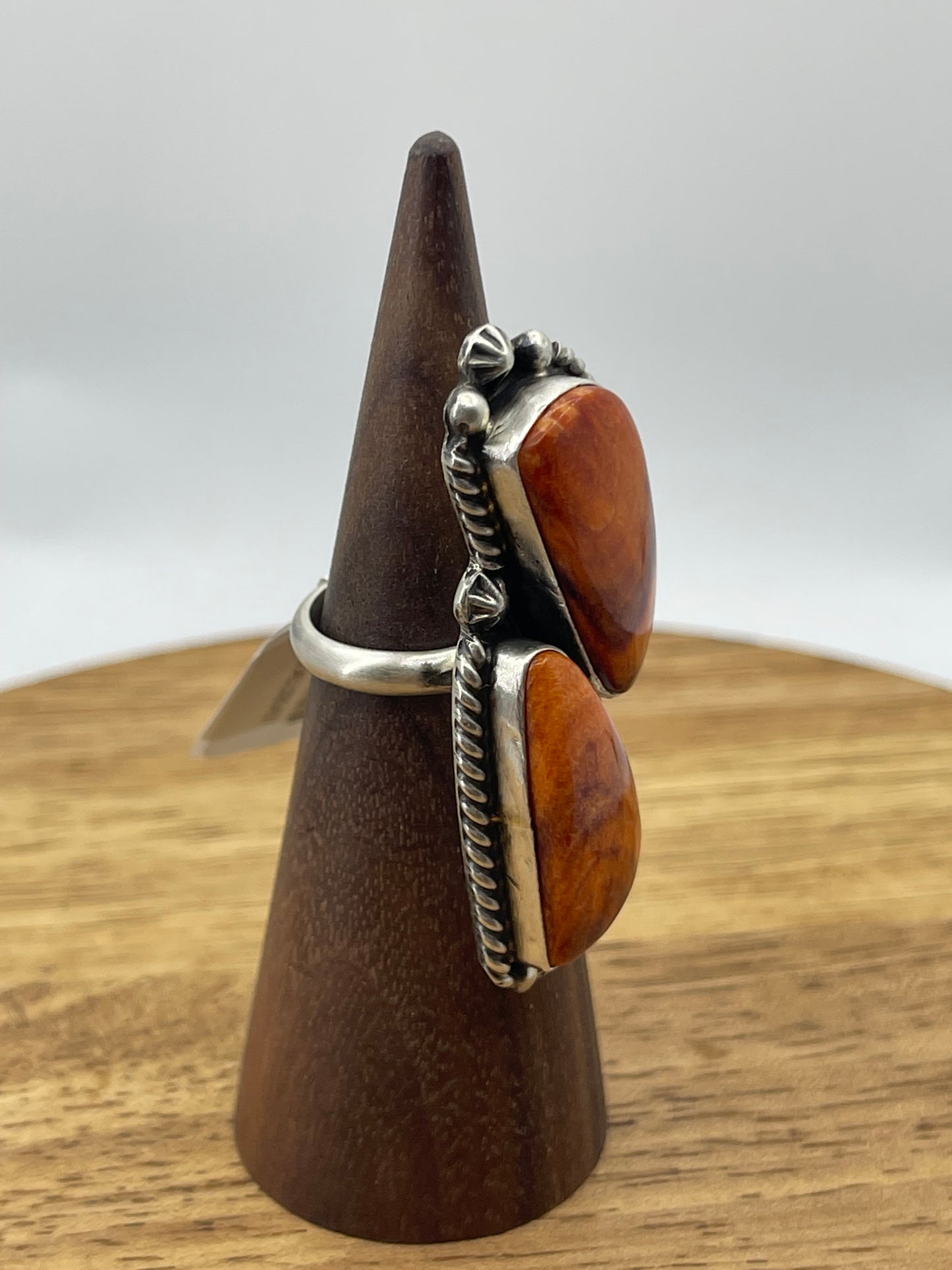 Adjustable 2 Stone Orange Spiny Oyster Shell ring by Eugene Belone, Navajo