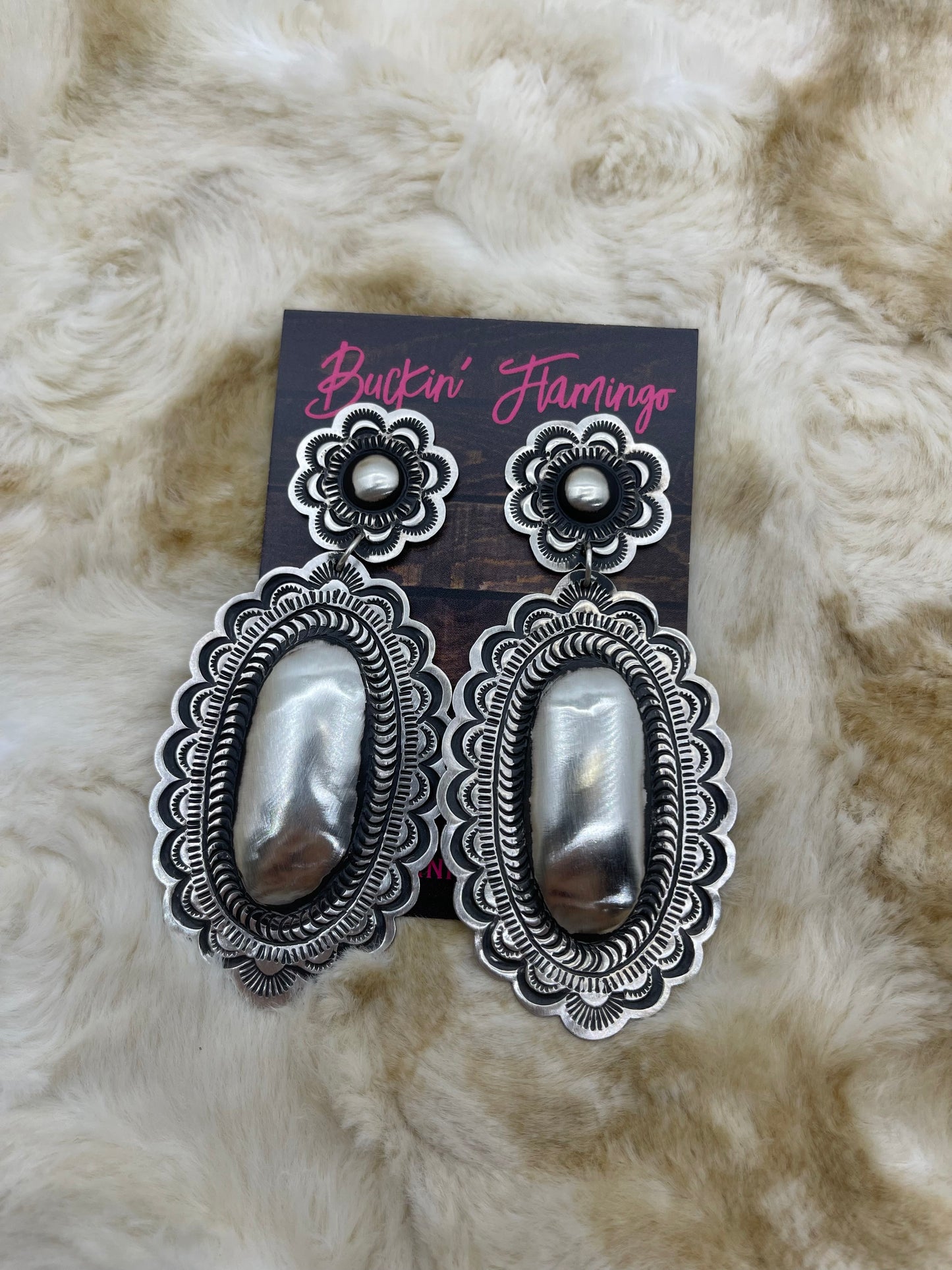 Oval Amazing Stamped Double Concho Earrings by Leander Tahe, Navajo